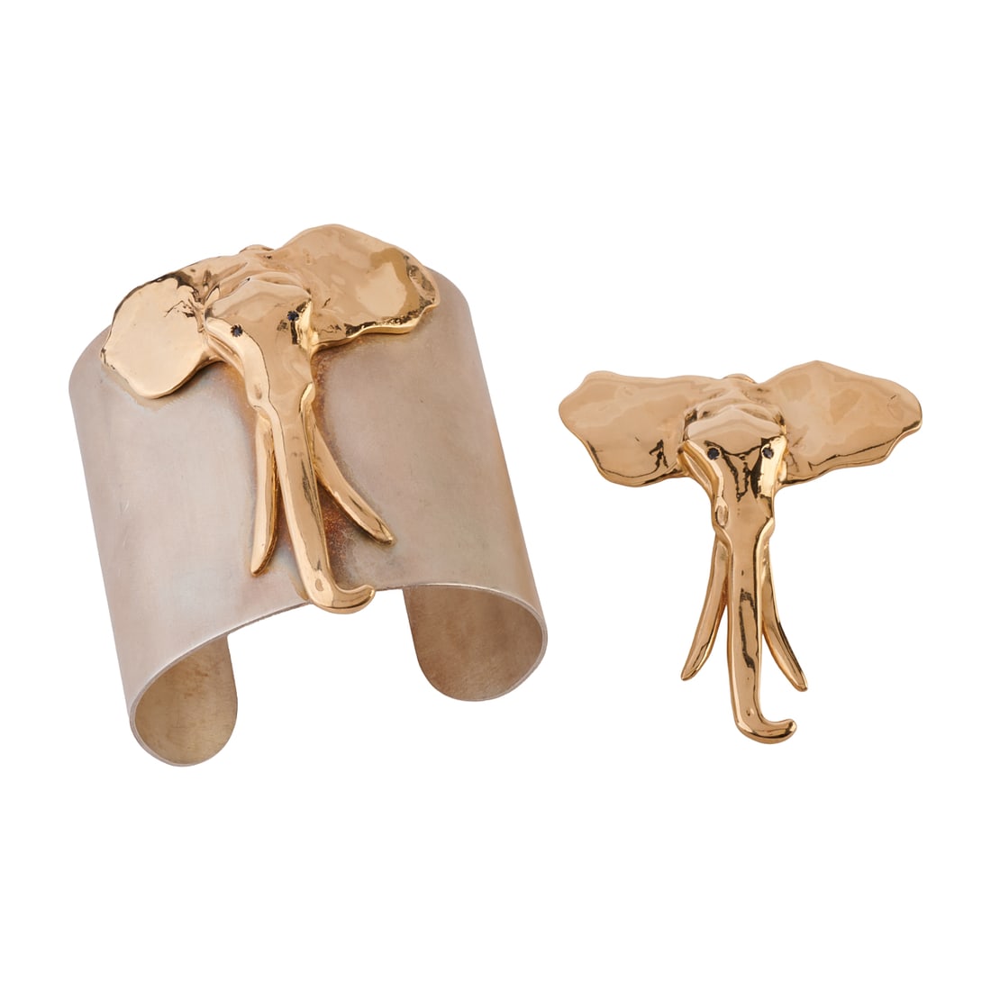 Gump's Mia Fonssagrives-Solow Sapphire, 14k Yellow Gold, Sterling Silver Elephant Jewelry Suite: Gump's Mia Fonssagrives-Solow Sapphire, 14k Yellow Gold, Sterling Silver Elephant Jewelry Suite. Including one sapphire, 14k yellow gold elephant head pendant brooch measuring approximately 66 x