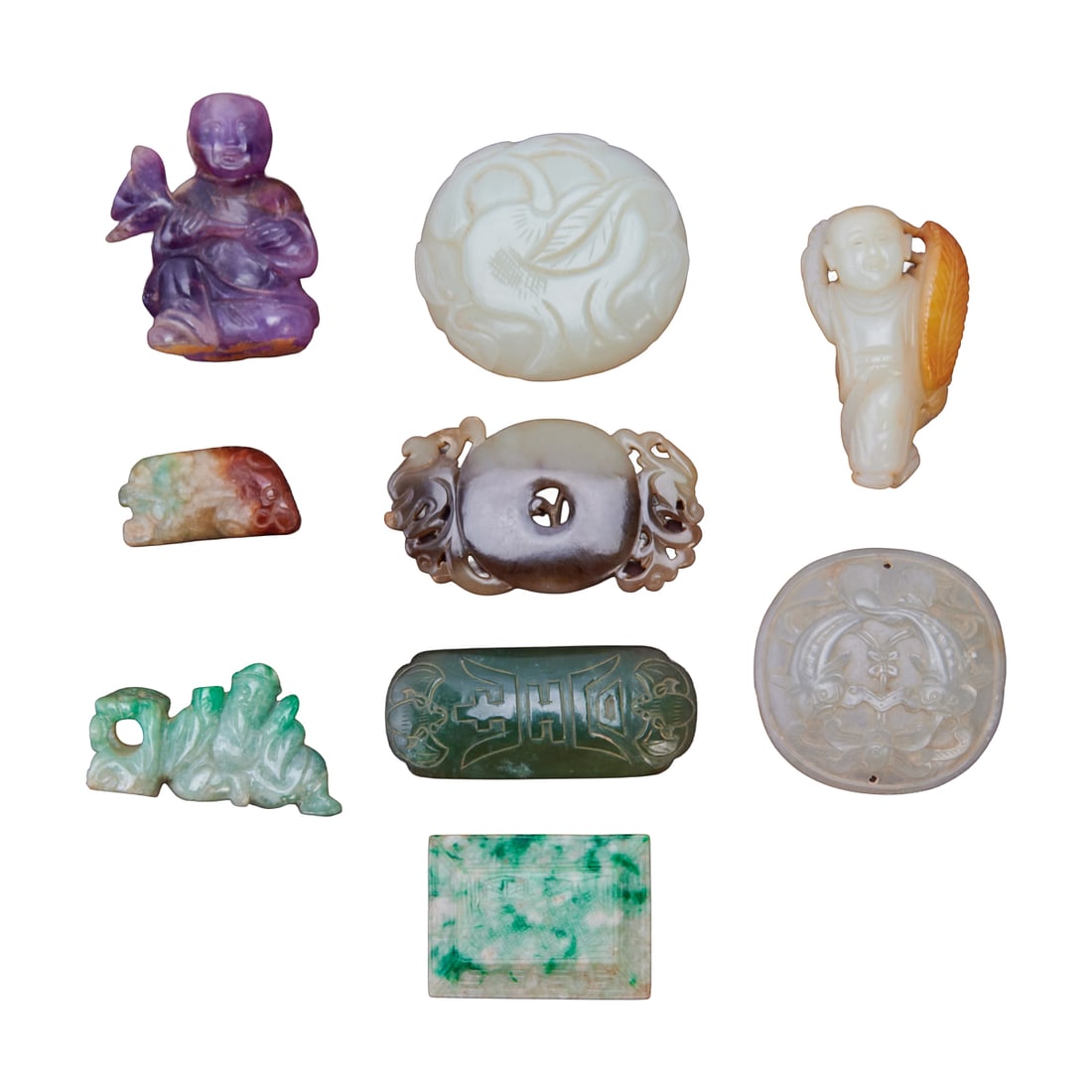 Group of Chinese Jade and Jadeite Carvings and Pendants. (1 of 5)