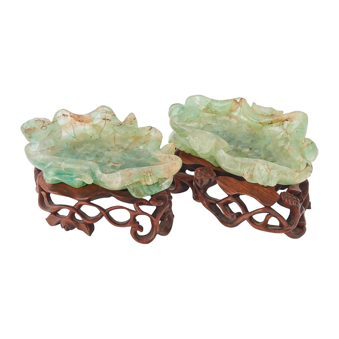 Pair of Chinese Green Quartz Lotus Brush Washers on Carved Wood Stands: Pair of Chinese Green Quartz Lotus Brush Washers on Carved Wood Stands. Pair of carved green quartz brush washers in the form of lotus leaves with undulating rims and naturalistic veining. The translu