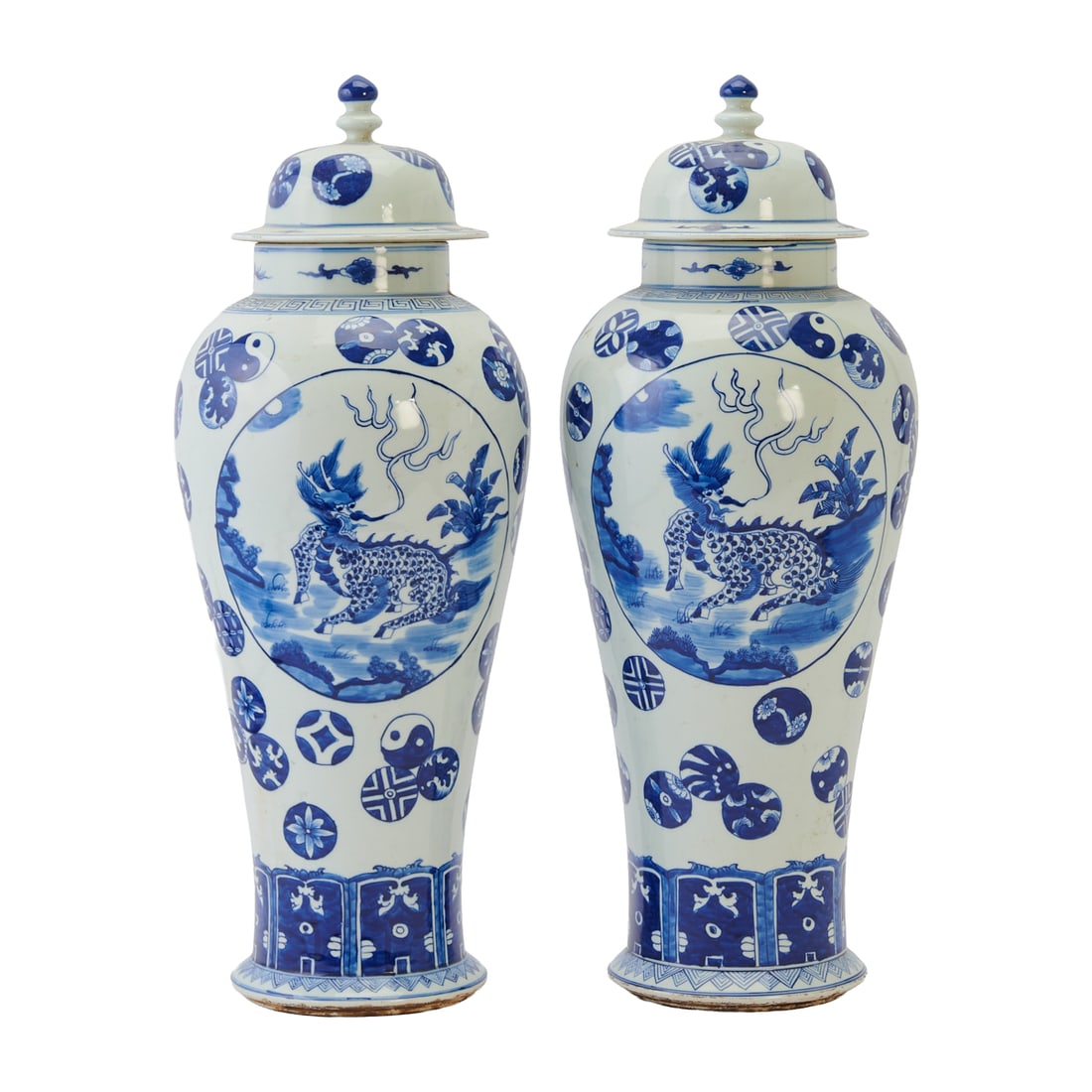 Pair of Chinese Blue and White Porcelain Lidded Vases: Pair of Chinese Blue and White Porcelain Lidded Vases. Pair of tall baluster-form porcelain vases with domed covers, decorated in underglaze blue. Each body painted with a central circular medallion d
