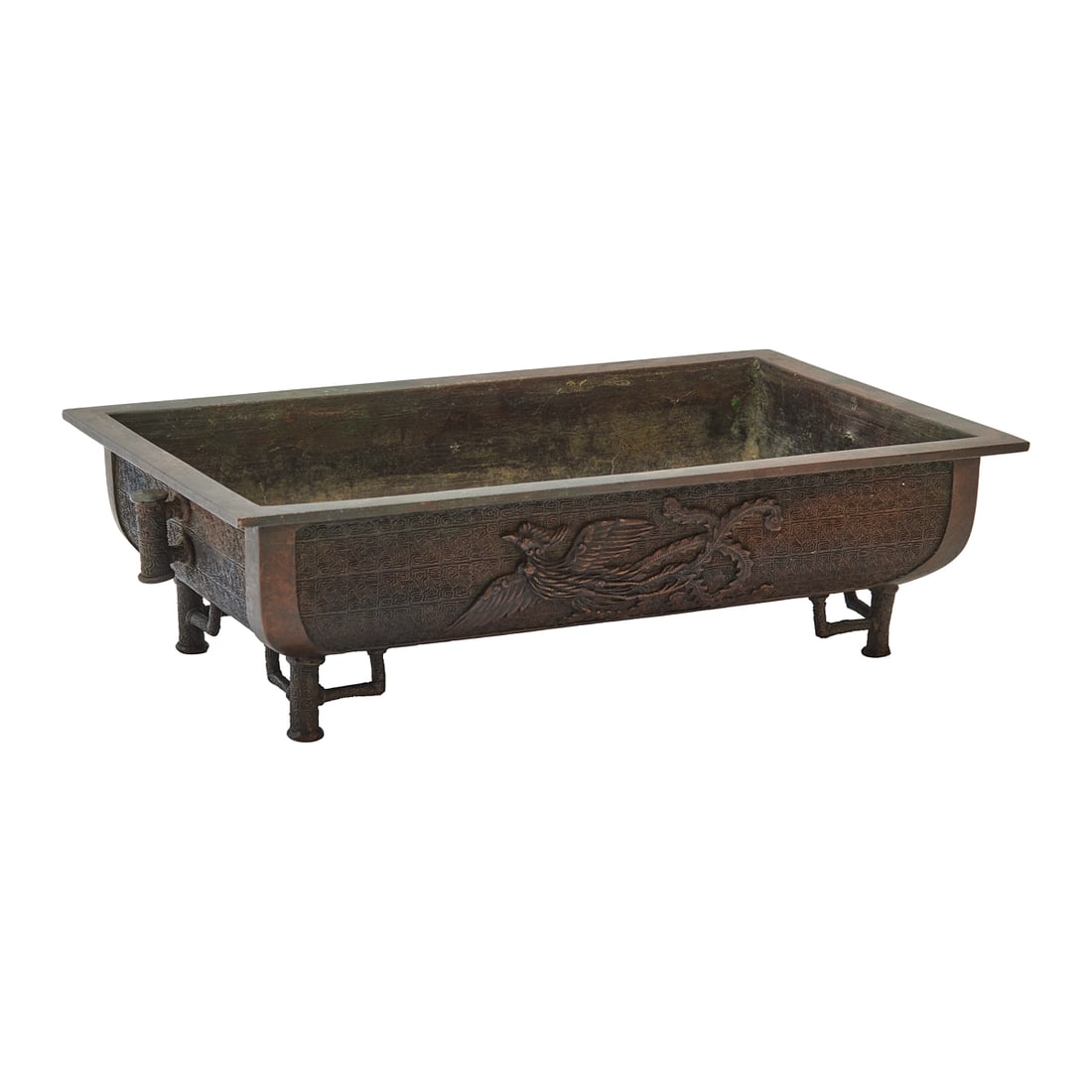 Japanese Cast Bronze Rectangular Planter: Japanese Cast Bronze Rectangular Planter. Rectangular bronze planter with slightly flared rim and supported on short cylindrical feet. The exterior decorated in relief with a phoenix in flight