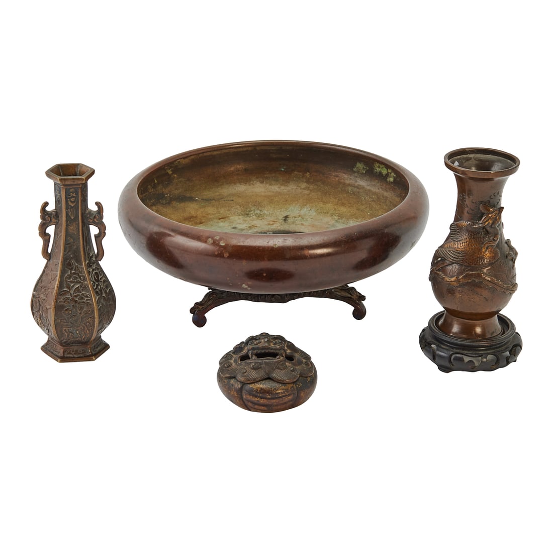 Four Japanese Bronze and Mixed Metal Items: Four Japanese Bronze and Mixed Metal Items.Group of four Japanese bronze and mixed metal items comprising a large shallow bronzebasin raised on a three-footed stand, a tall hexagonal vase with