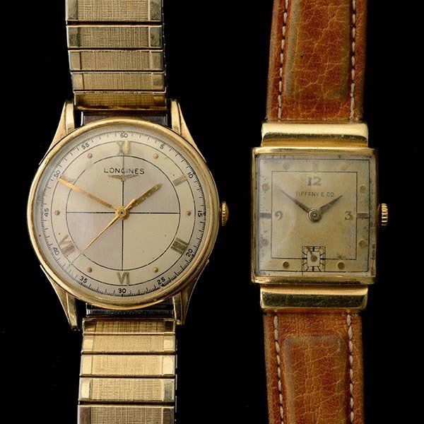 COLLECTION OF TWO YELLOW GOLD WRISTWATCHES.: COLLECTION OF TWO YELLOW GOLD WRISTWATCHES. Including one Tiffany & Co., Hamilton, 14k yellow gold rectangular, hooded lugs, 32 mm wristwatch together with one Longines 14k yellow gold, round, front o