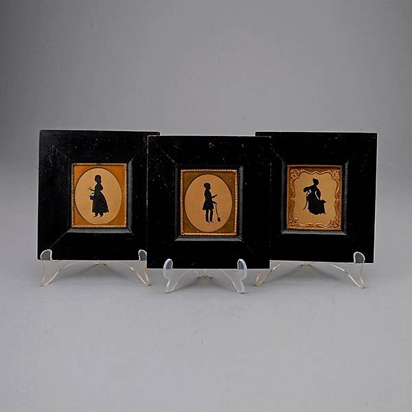 Three American Folk Cut Silhouettes: Three American Folk Cut Silhouettes, of mother, son, and daughter, incorporating gilt metal frame mounts {Dimensions 6 1/2 x 6 inches}