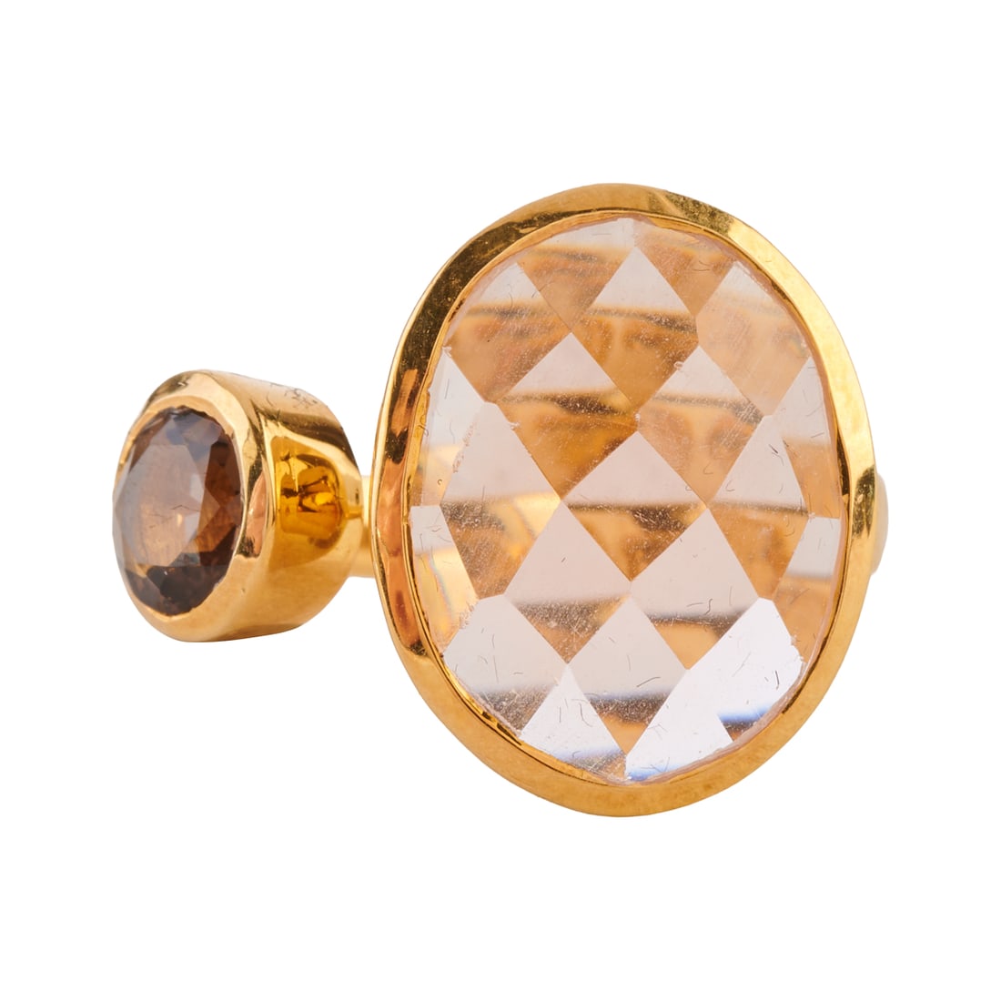 Quartz, Vermeil Cuff Ring: Quartz, Vermeil Cuff Ring. Featuring one oval shaped, faceted-top rose quartz, accented by one round-cut smoky topaz, bezel set in a vermeil cuff mounting. {Size: 6 3/4, Gross Weight: 3.3 dwts}