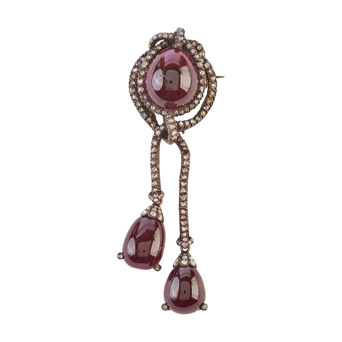 Victorian Garnet, Diamond, Silver-Topped, 9k Rose Gold Brooch: Victorian Garnet, Diamond, Silver-Topped, 9k Rose Gold Brooch. Featuring three pear shaped garnet cabochons, the central one with a carved back, accented by rose-cut diamonds, set in a silver-topped, 
