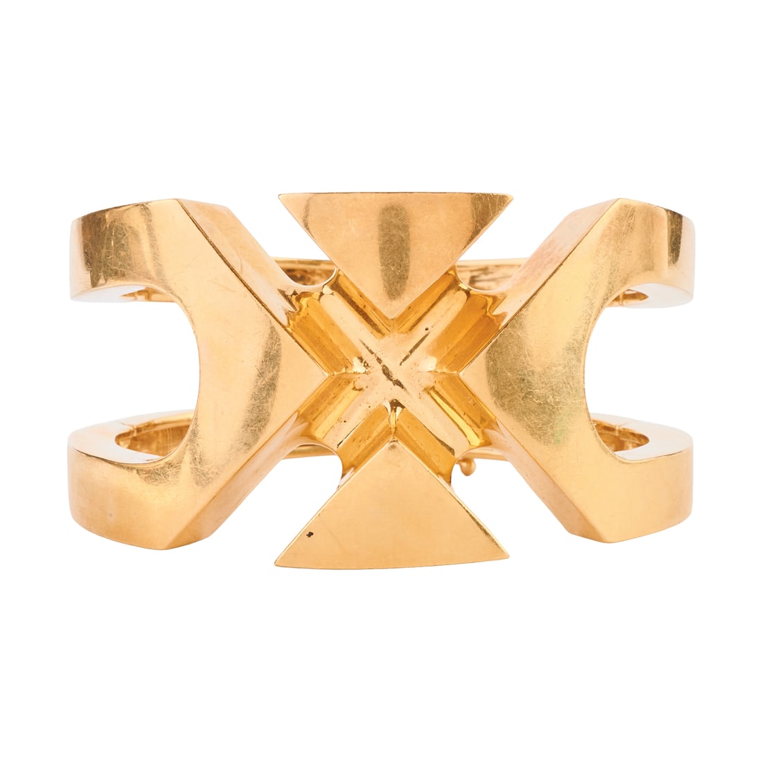 18k Yellow Gold "X" Bracelet: 18k Yellow Gold "X" Bracelet. The 18k yellow gold "X" motif double hinged bangle bracelet measuring approximately 38 mm to 23 mm in width, completed by a pin clasp with figure eight safety and with