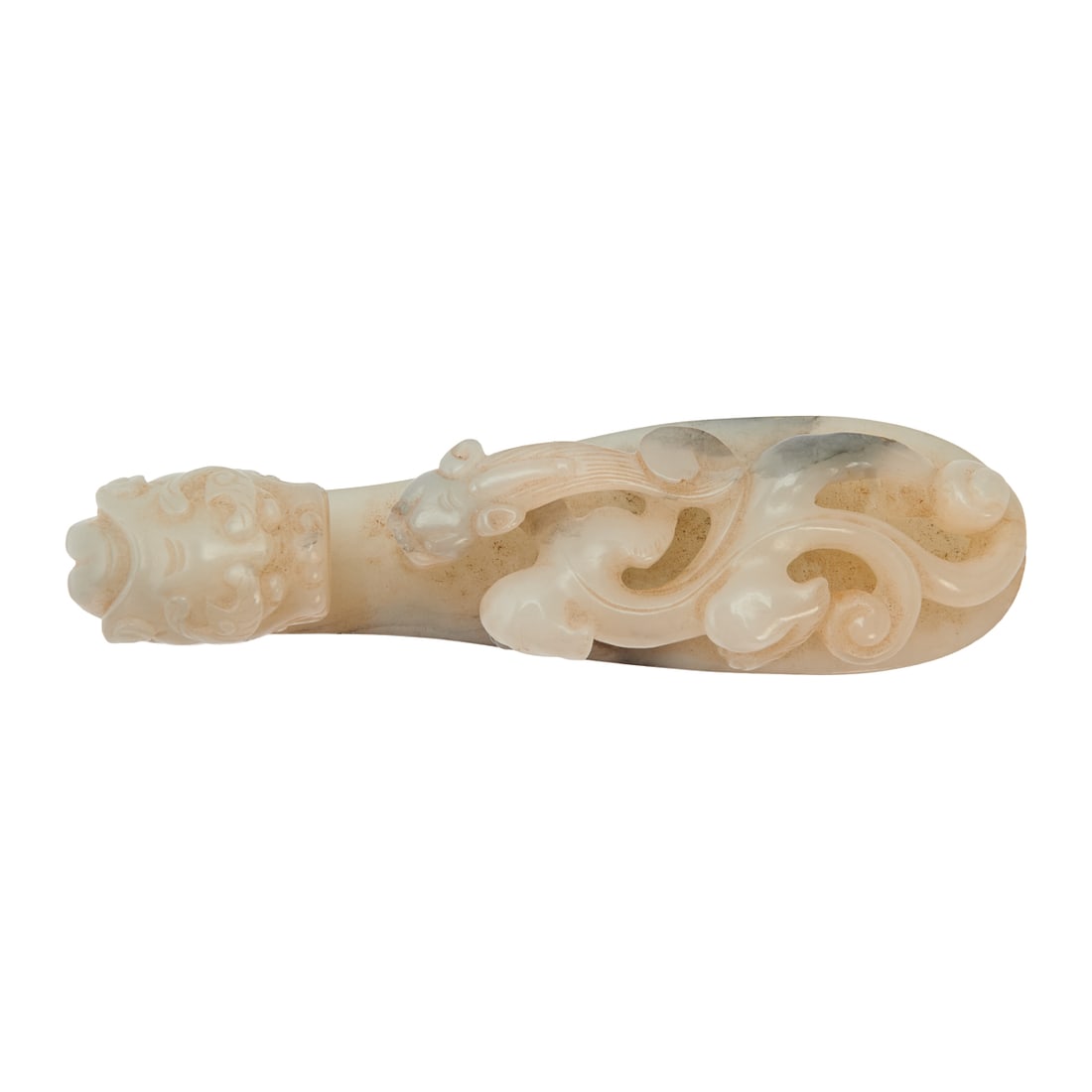 Qing White Jade Carved Dragon Belt Hook: Qing Dynasty White Jade Carved Dragon Belt Hook Finely carved from white jade of even tone and lustrous translucency, the belt hook is modeled with a dragon-head terminal, its eyes boldly rendered and