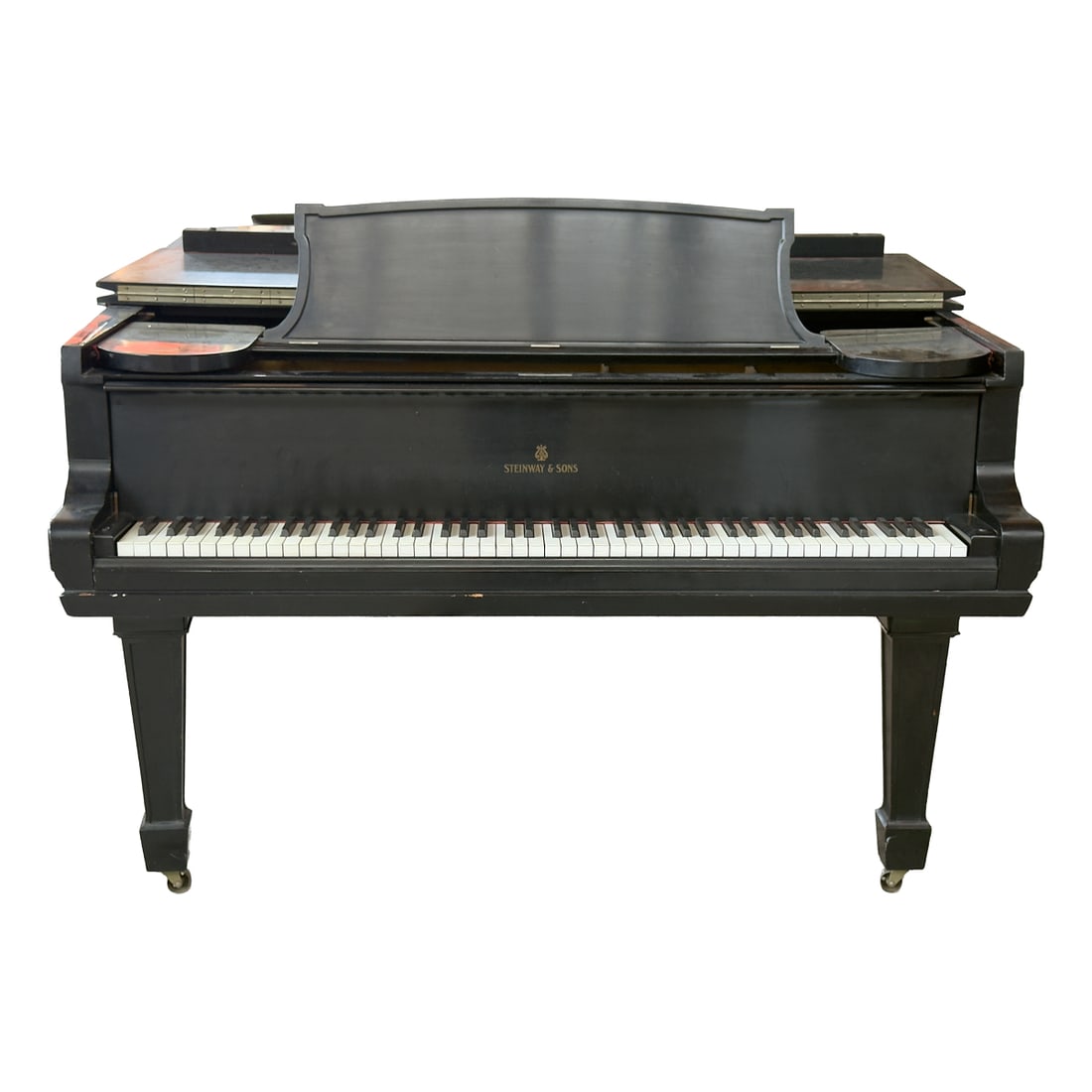 Steinway Ebonized Grand Piano with Bench and Sheet Music, serial number 84063. Stencilled "NA" to (1 of 13)