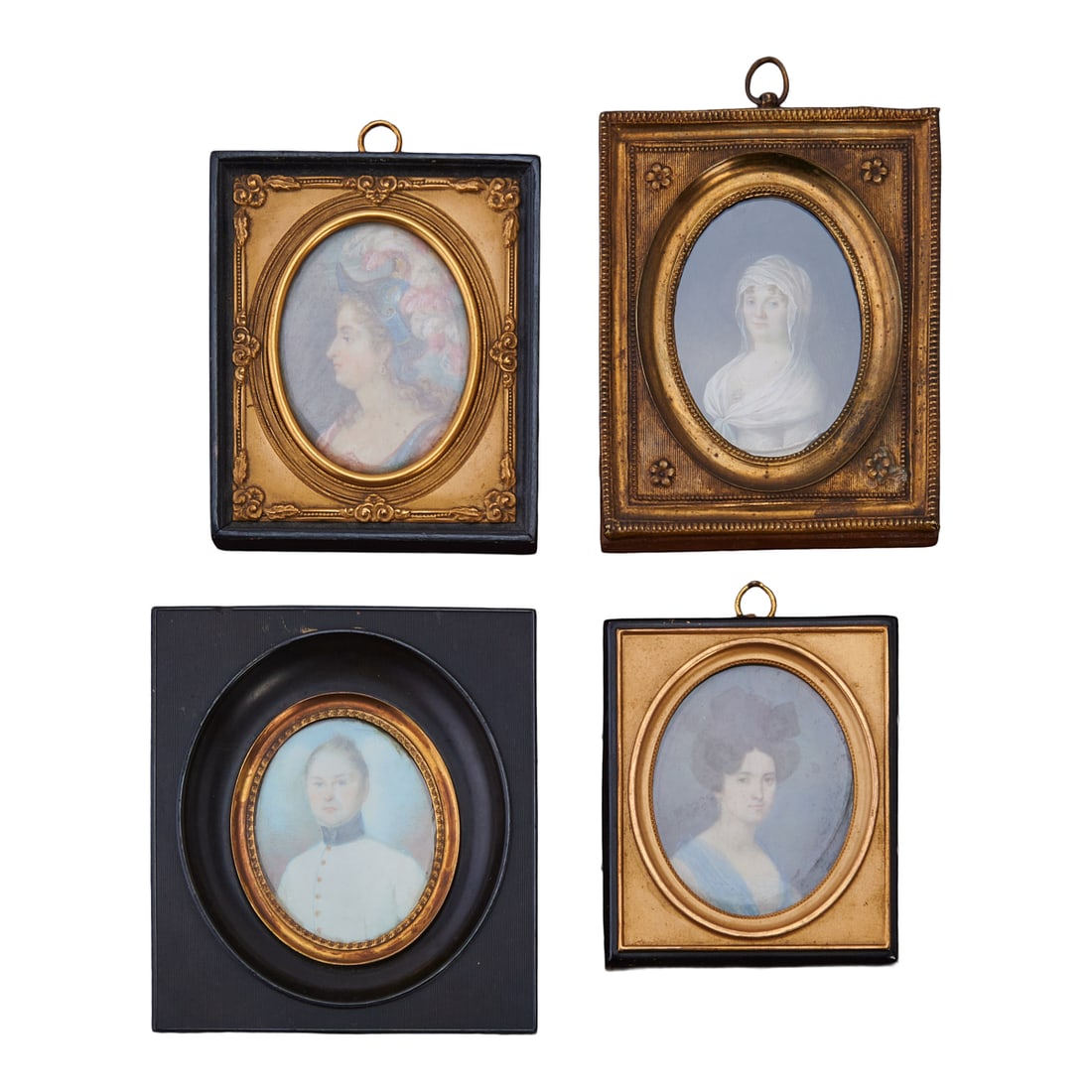 Four Framed Portrait Miniatures. The four comprising.one gentleman in naval dress, and three ladies, (1 of 5)