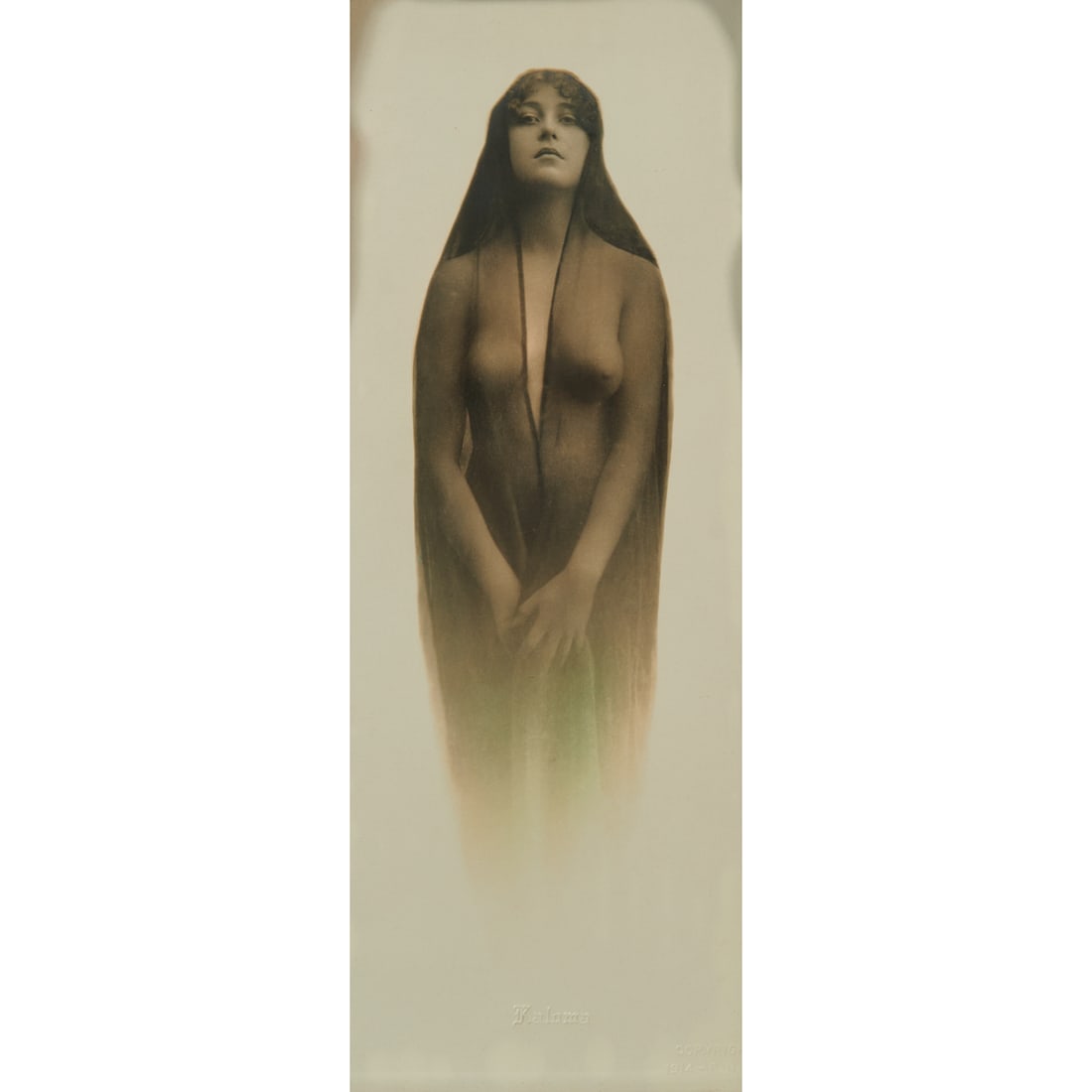 Framed photo.entitled Kaloma, purportedly of Josephine Earp, wife of Wyatt Earp..Comprising a black: Framed photo.entitled Kaloma, purportedly of Josephine Earp, wife of Wyatt Earp..Comprising a black and white photogravure.of a nude young woman in frontal pose wearing a sheer gown with a plunge neck