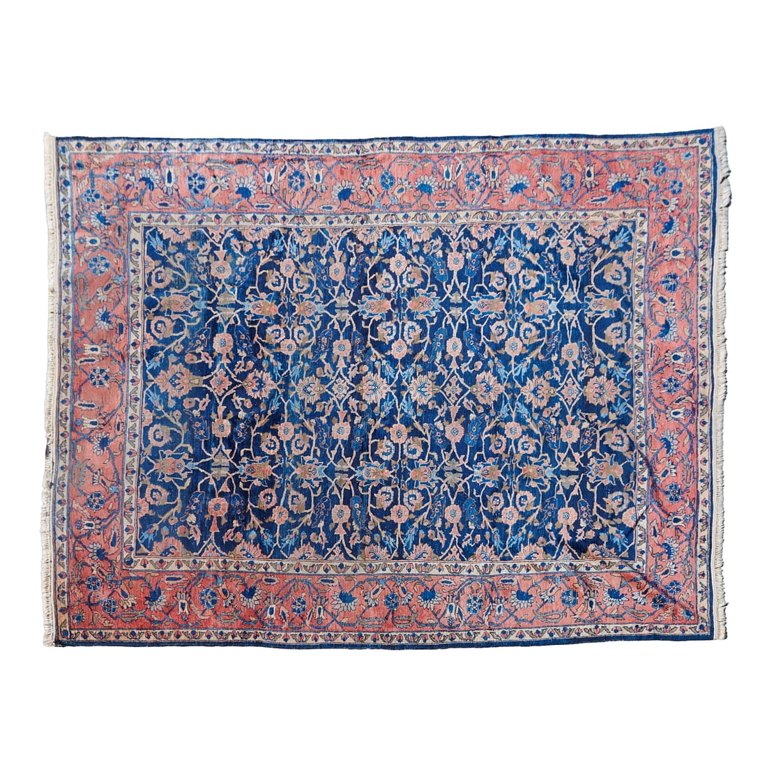 Persian Heriz Rug, 19th Century, the blue field woven with foliate designs in oche and light blue,: Persian Heriz Rug, 19th Century, the blue field woven with foliate designs in oche and light blue, in medallions and foliate bands, the primary border with red pink field, woven with dense blossoming 
