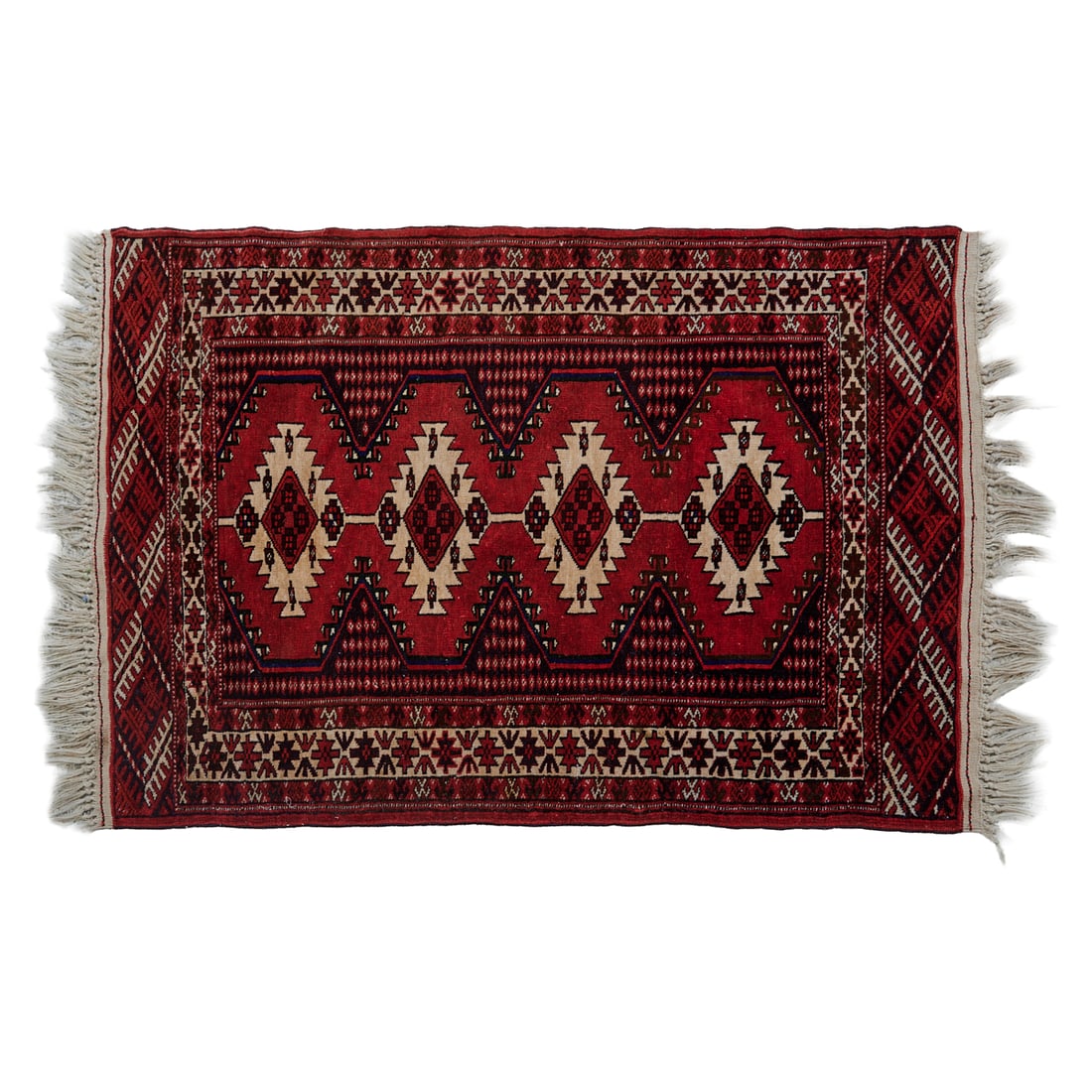 Turkmen Finely Woven Wool Rug, woven with four guls to central field, in shades of red, brown off (1 of 3)