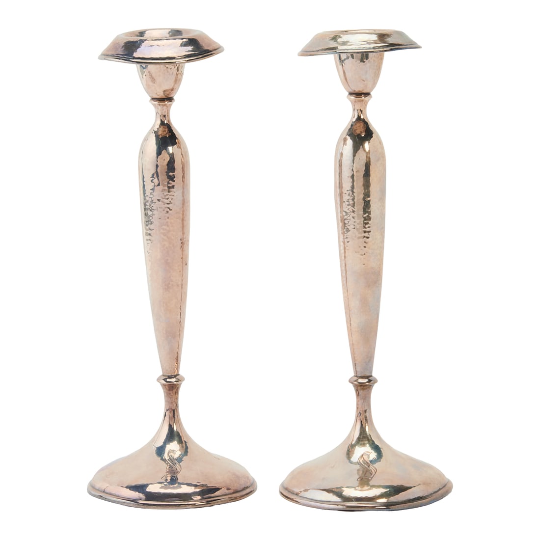 Pair of Shreve and Company Hammered Sterling Silver Candlesticks, weighted bases. Marked to: Pair of Shreve and Company Hammered Sterling Silver Candlesticks, weighted bases. Marked to undersides: SHREVE ampersand CO / STERLING / SAN FRANCISCO. Pattern number 9135. Monogrammed capital Gothic
