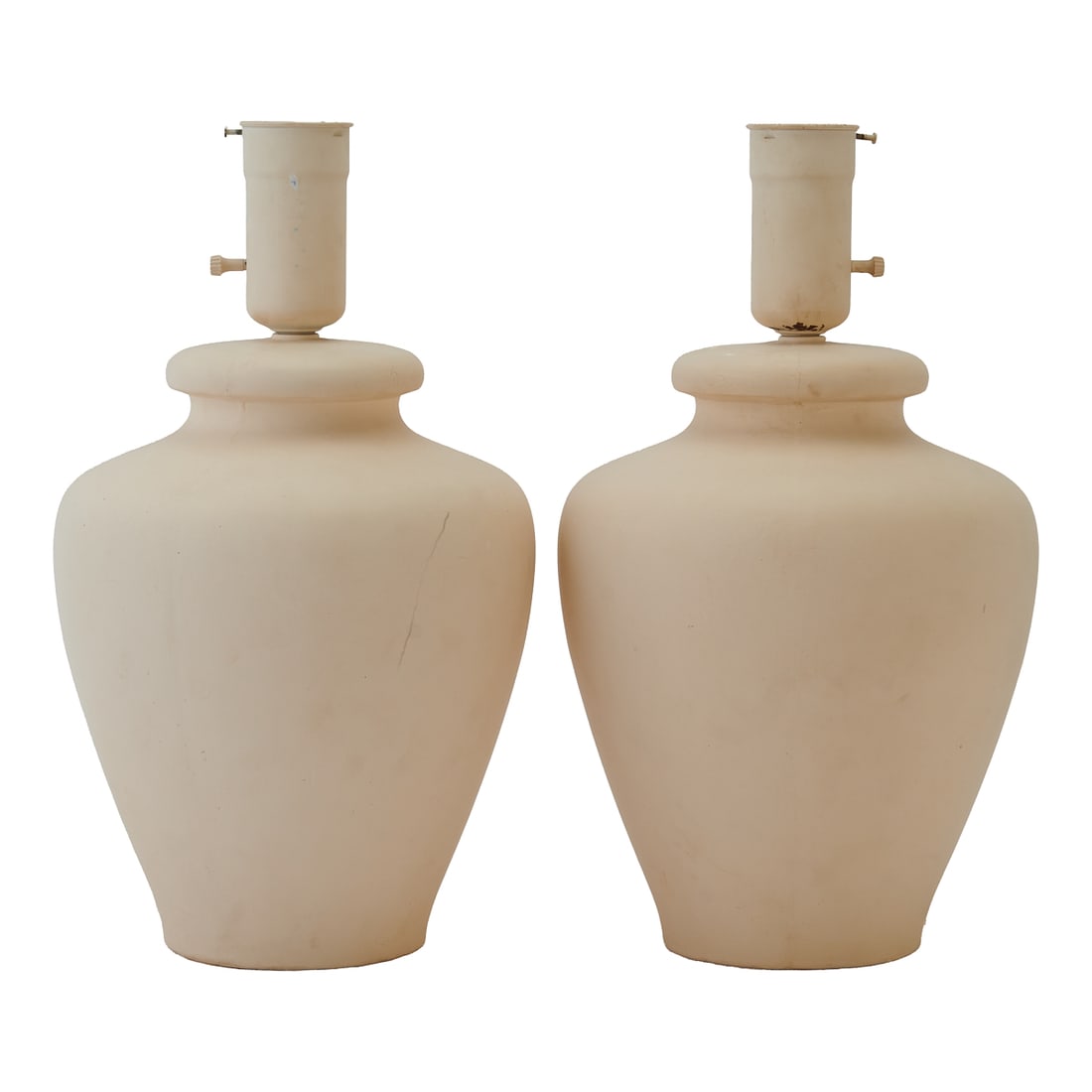 Pair of White Cast Plaster Base Table Lamps Attributed to Michael Taylor. Urn form bases issuing the: Pair of White Cast Plaster Base Table Lamps Attributed to Michael Taylor. Urn form bases issuing the sockets. Circa 1975.. {Approximate dimensions - each: 19" high x 11" wide.}.