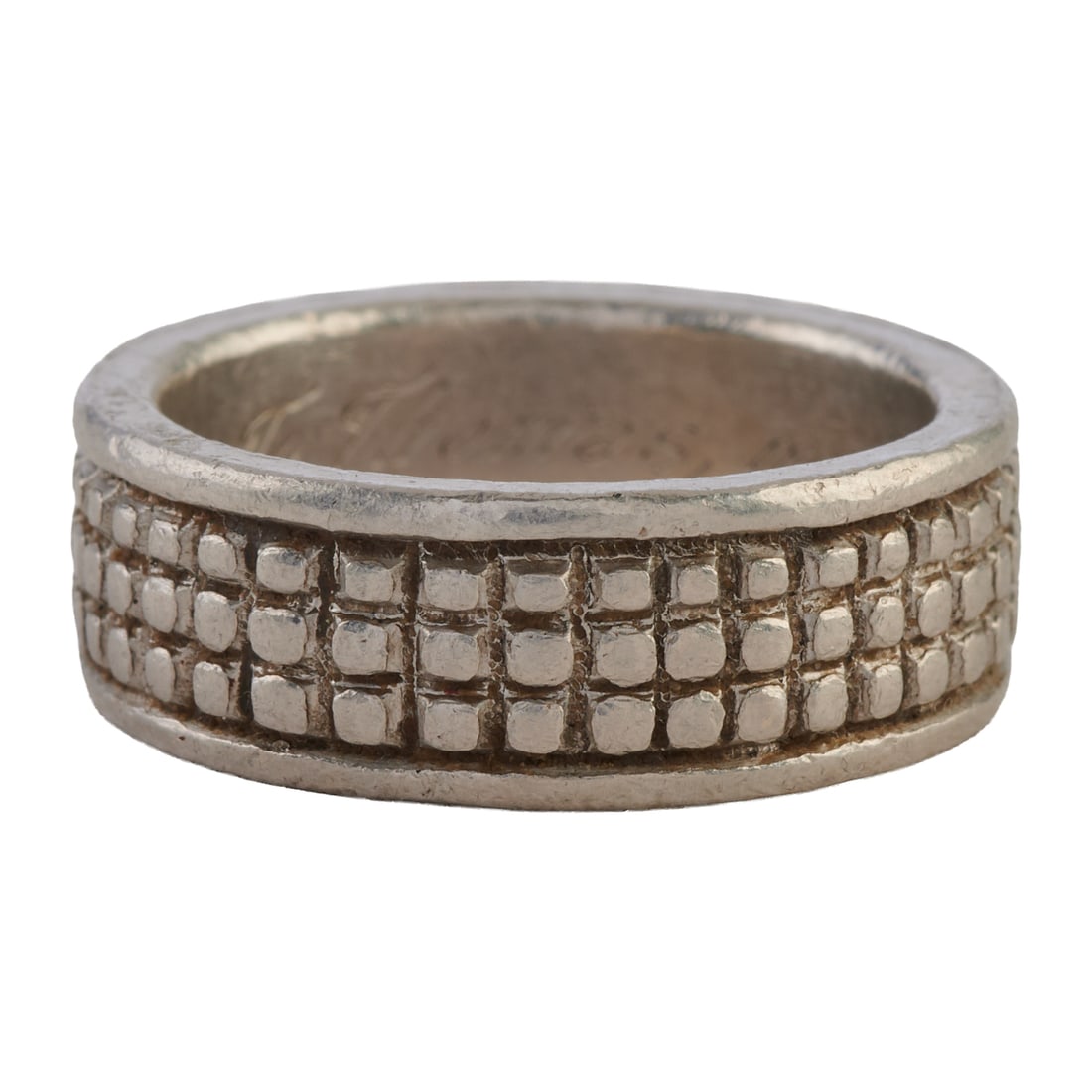 Platinum Band. The textured platinum band measuring approximately 8 mm in width. {Size: 8 1/4, Gross: Platinum Band. The textured platinum band measuring approximately 8 mm in width. {Size: 8 1/4, Gross Weight: 14.0 dwts}