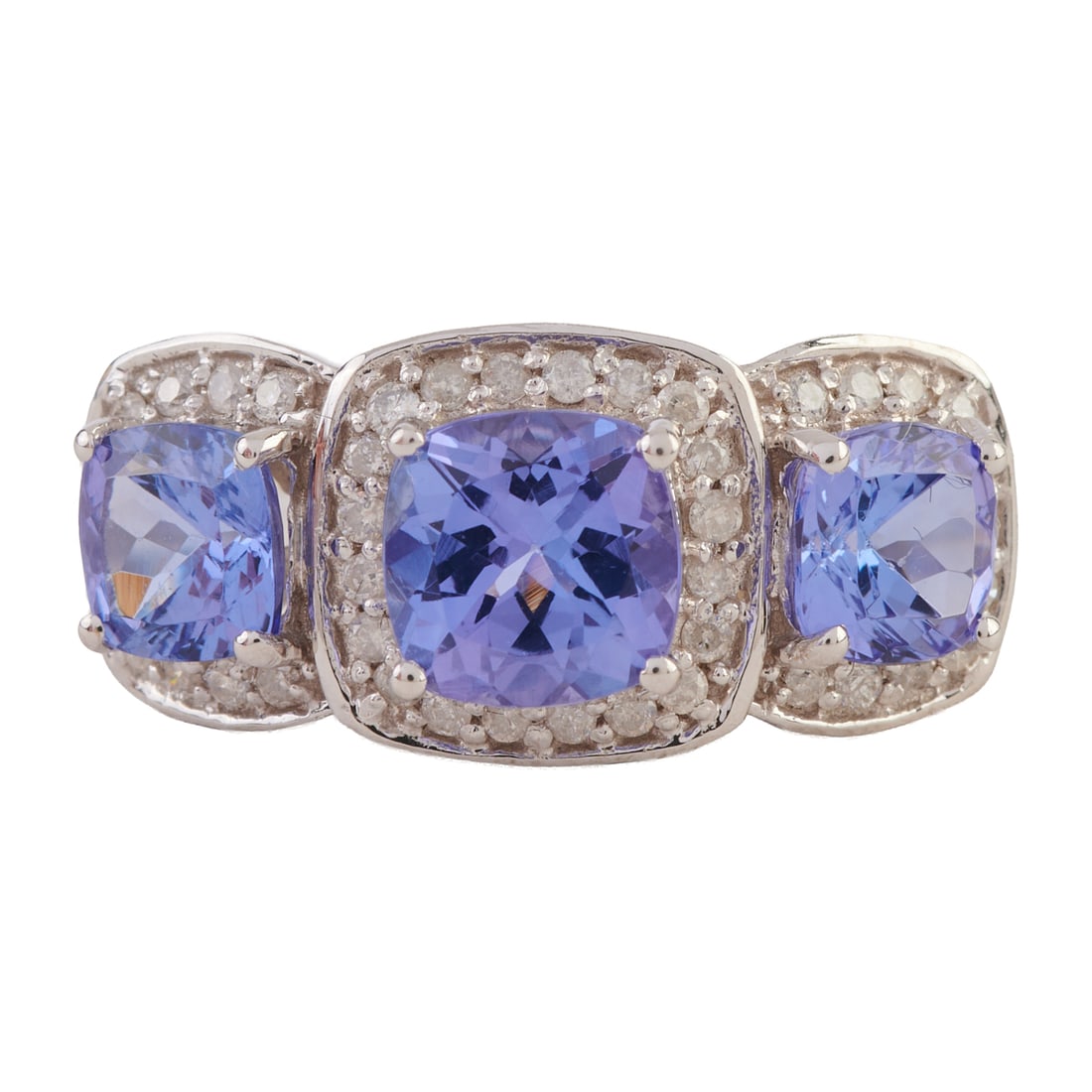 Tanzanite, Diamond, 14k White Gold Ring. Featuring three cushion-cut tanzanites weighing a total of (1 of 4)