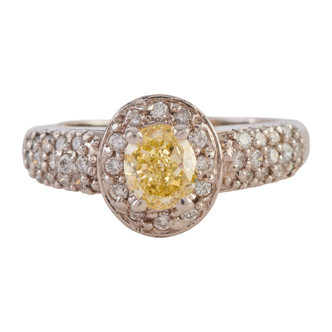 Yellow Diamond, Diamond, 18k White Gold Ring. Featuring one oval-cut yellow diamond weighing (1 of 4)