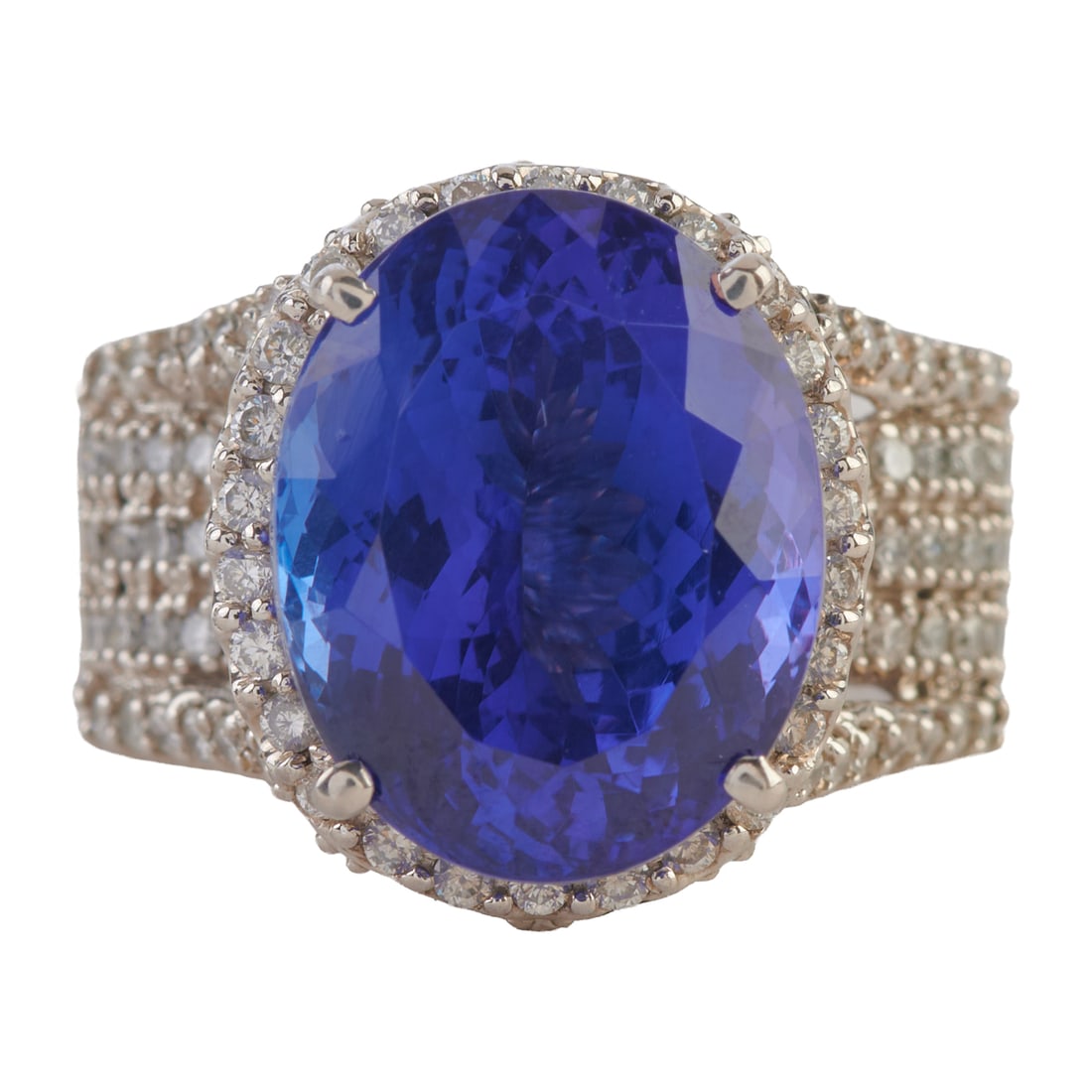 Rhapsody Tanzanite, Diamond, Platinum Ring. Featuring one oval-cut tanzanite weighing approximately (1 of 4)