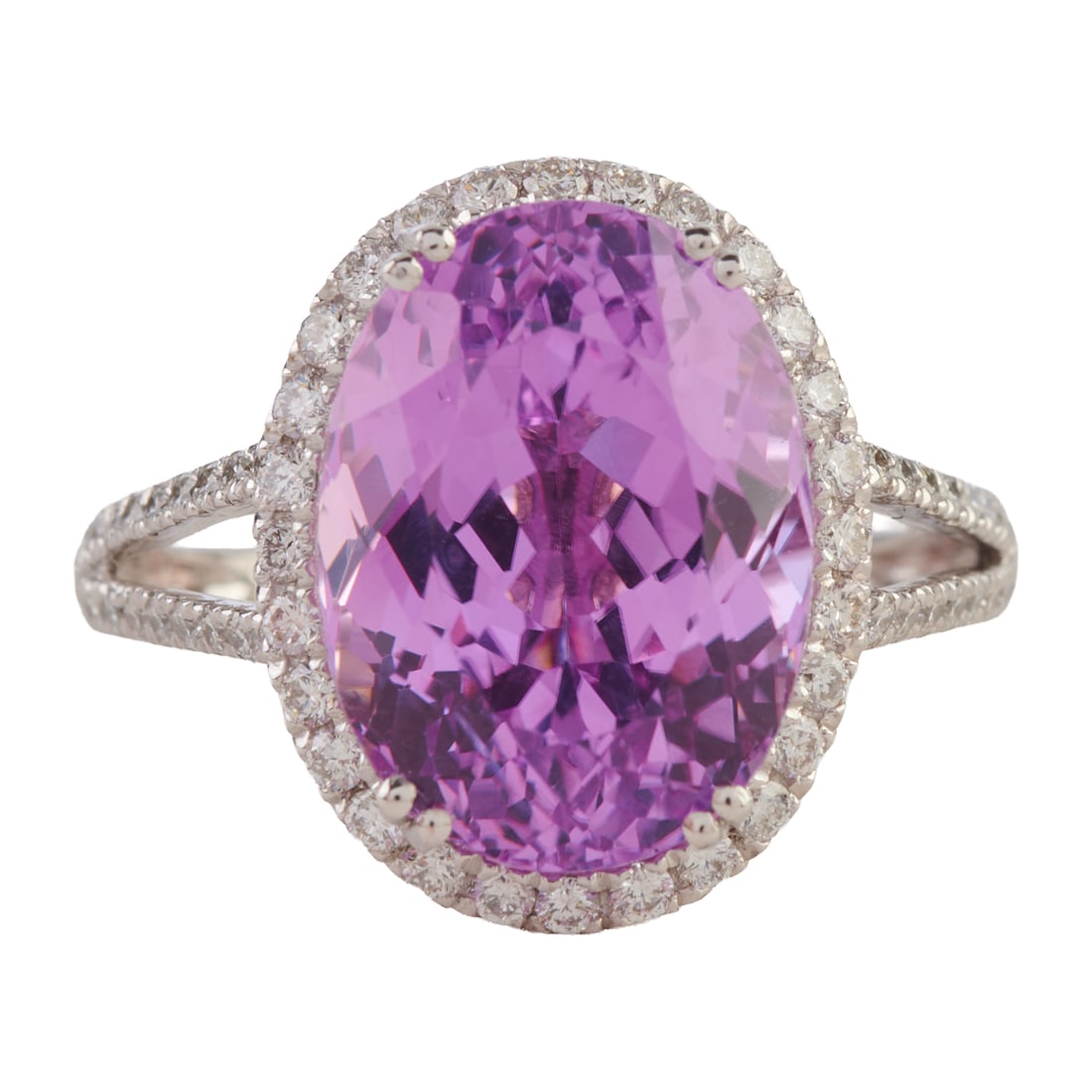 Kunzite, Diamond, Platinum Ring. Featuring one oval-cut kunzite weighing approximately 7.50 cts., (1 of 6)