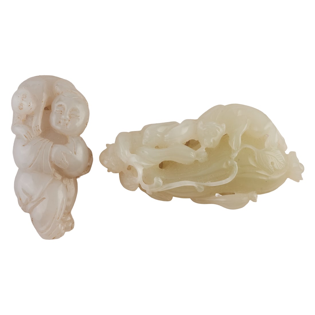 Two Carved Mutton Fat Jade Pendants. Including one carved mutton fat jade figural pendant depicting (1 of 4)