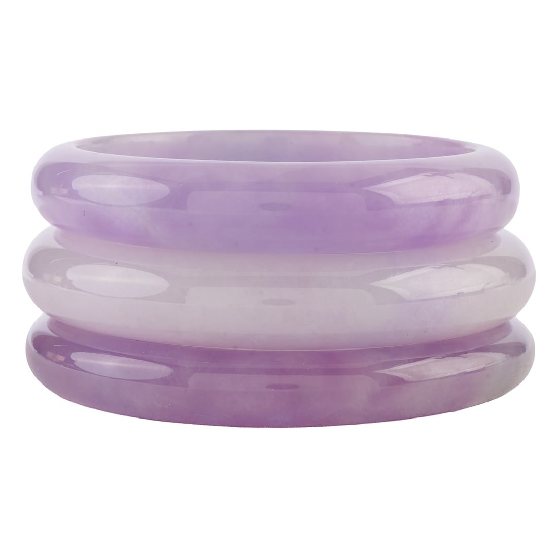Collection of Three Lavender Jade Bracelets. Including one lavender jade bangle bracelet measuring: Collection of Three Lavender Jade Bracelets. Including one lavender jade bangle bracelet measuring approximately 12.5.mm in width, with an internal diameter of approximately 59.mm; one lavender jade b