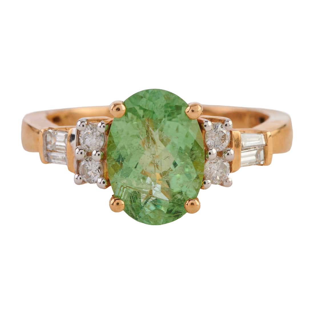 Green Tourmaline, Diamond, 14k Yellow Gold Ring. Featuring one oval-cut, faceted-top green (1 of 4)