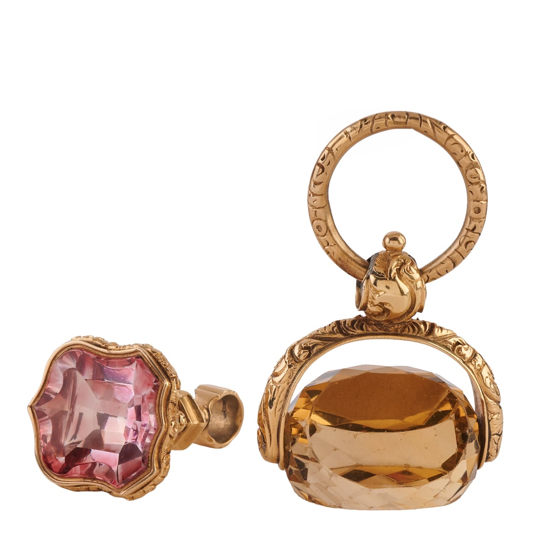 Two Victorian Multi-Stone, Yellow Gold Fobs. Including one articulated citrine, 14k yellow gold fob: Two Victorian Multi-Stone, Yellow Gold Fobs. Including one articulated citrine, 14k yellow gold fob measuring approximately 55 x 34 mm together with one foiled glass, 9k yellow gold fob measuring