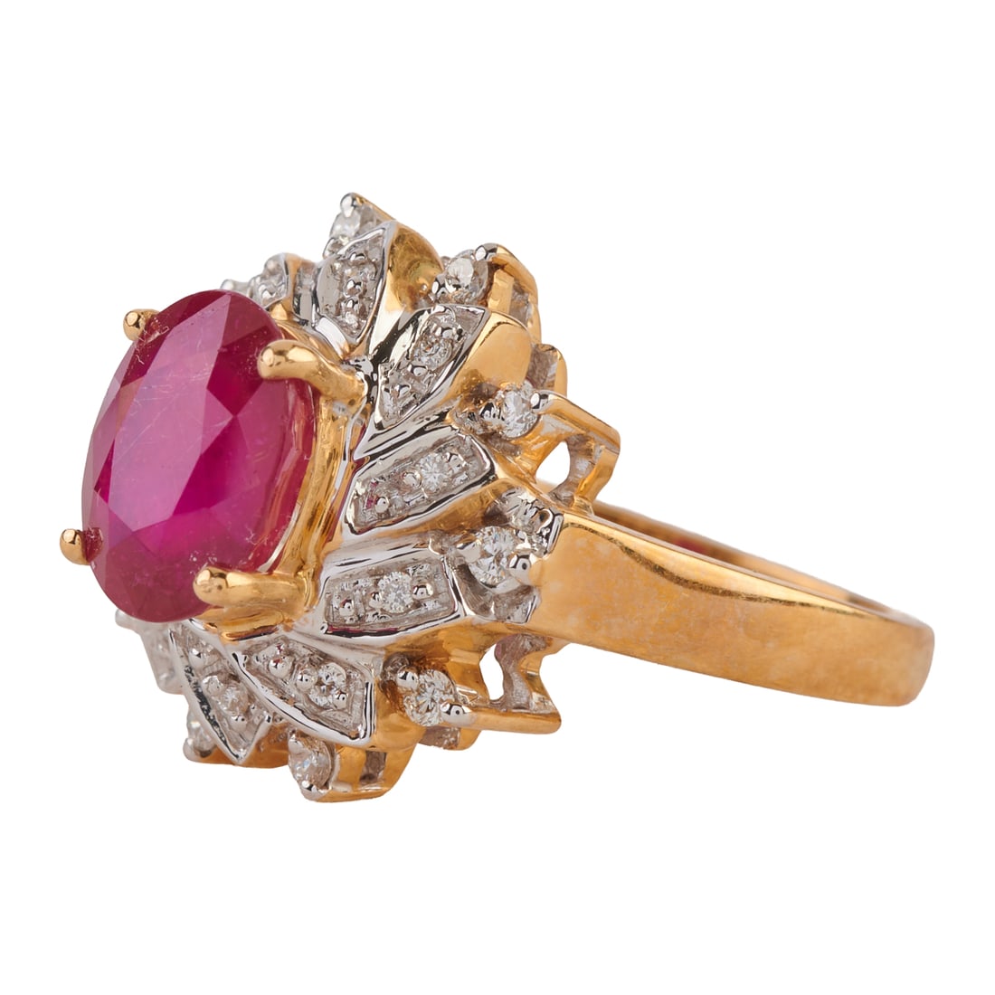 Ruby, Diamond, 14k Yellow and White Gold Ring. Featuring one oval-cut ruby weighing approximately - 2