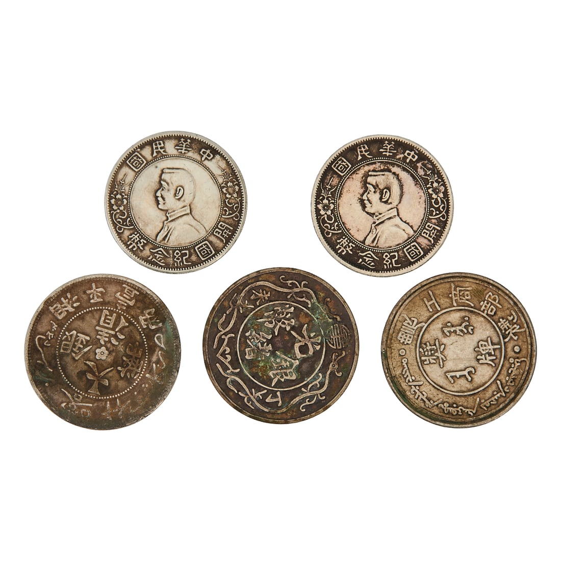 Chinese Silver Alloy CoinsA group of silver alloy coins of various types and dates. Featuring: Chinese Silver Alloy CoinsA group of silver alloy coins of various types and dates. Featuring assorted designs and inscriptions, the group offers an interesting representation of historical coinage an