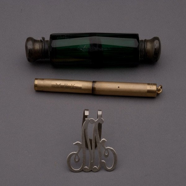 Perfume Bottle, Fountain Pen, Silver bookmark: Group Lot: a green glass double sided perfume bottle; a gold filled Wahl fountain pen; and a sterling "M" bookmark (3) {Length of bottle 4 inches} [Chips and dents to bottle]