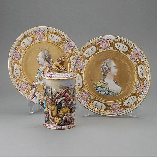 Pair of Capodimonte Plaques and a Lidded Mug: Pair of Capodimonte Plaques Depicting Louis XVI and Marie Antoinette, Together with a Lidded Mug with Lion Finial {Height of mug 8 1/2 inches; diameter of plaque 10 inches}