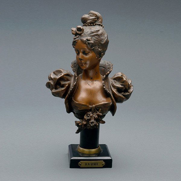 Cold Painted Spelter Bust, inscribed Brune: Cold Painted Spelter Bust of a Woman, inscribed Brune {Height 11 3/4 inches}