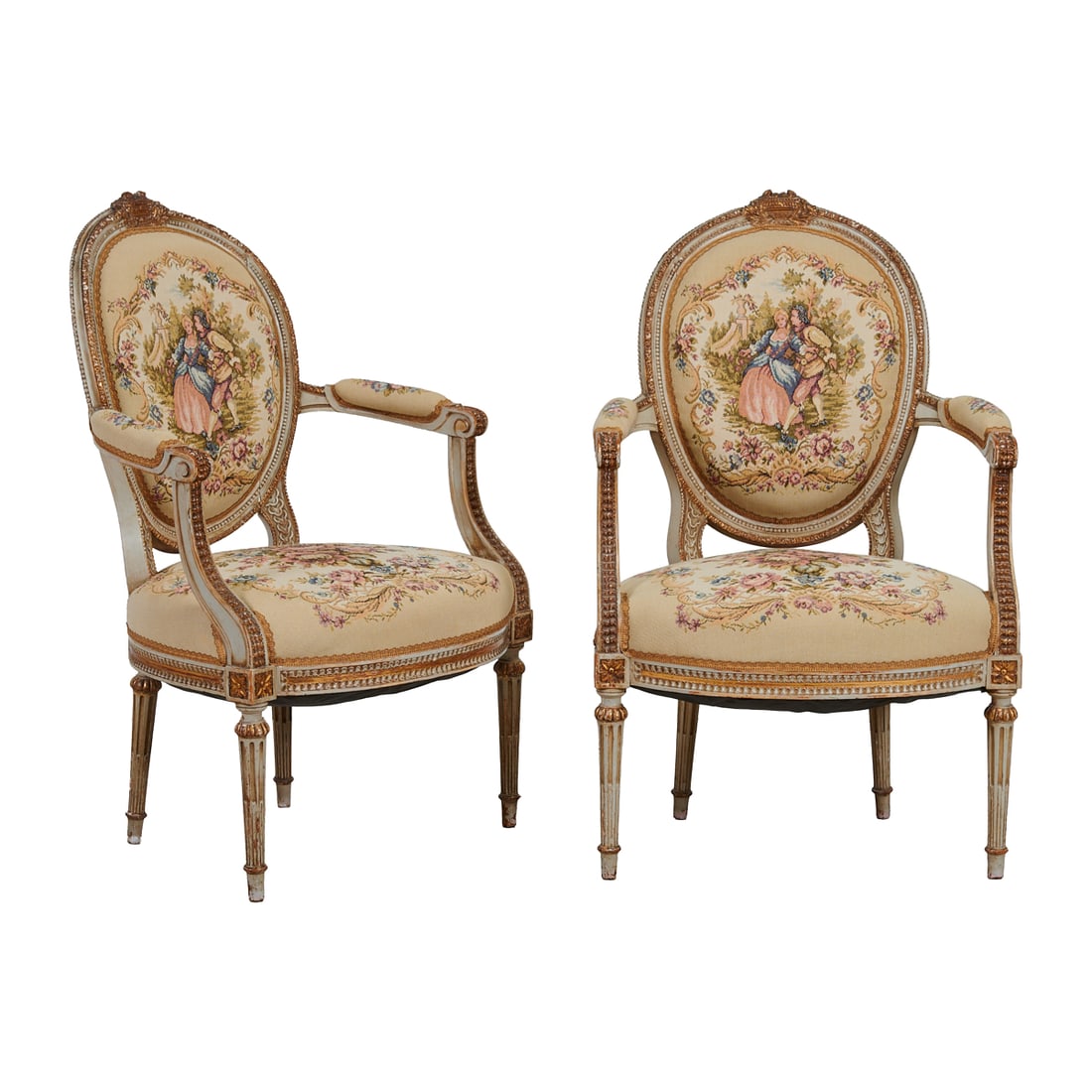 Pair of Painted Louis XVI Style Fauteuils, oval frame backs carved with urns surrounded by laurel: Pair of Painted Louis XVI Style Fauteuils, oval frame backs carved with urns surrounded by laurel leaves to crest, padded, rounded arms, and bow front seat, issuing ribbed tapering straight legs. The 