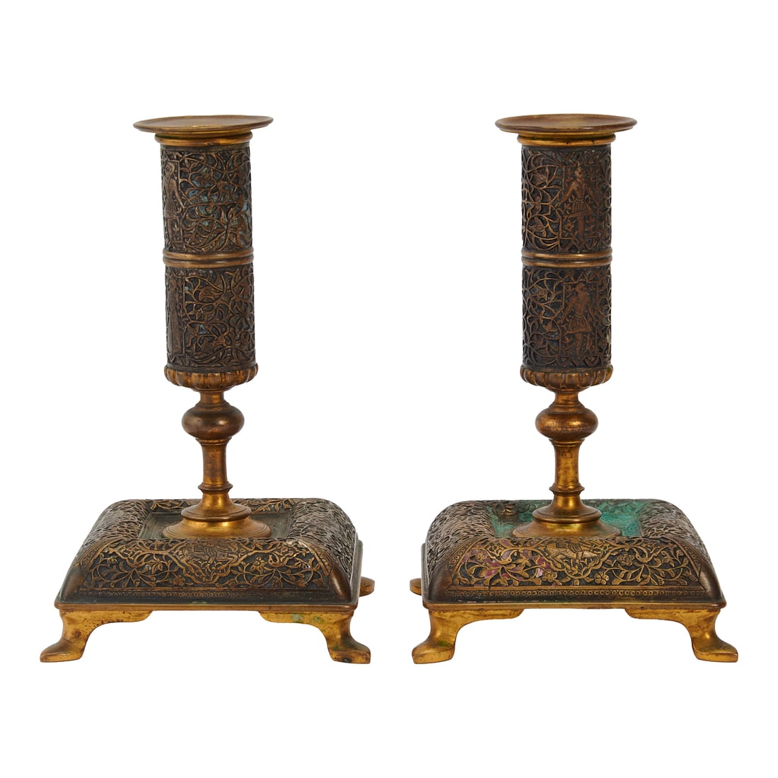 Pair of Gilt Bronze Candlesticks attributed to Tiffany & Co. With Indo-Persian decorative motif,: Pair of Gilt Bronze Candlesticks attributed to Tiffany & Co. With Indo-Persian decorative motif, previously with enamel fill. Undersides with old "105"pen mark. {Approximate dimensions: 7 3/8" high x 