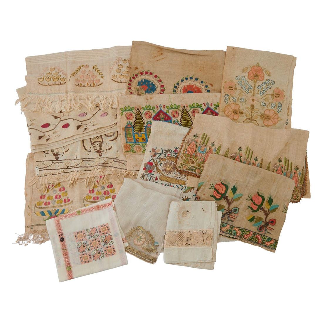 Collection of Antique Turkish Towels with Embroidery, all with embroidered sections, most with: Collection of Antique Turkish Towels with Embroidery, all with embroidered sections, most with stylized foliate, floral and house designs, and some with silver or gold wrapped threads. 19th Century. T