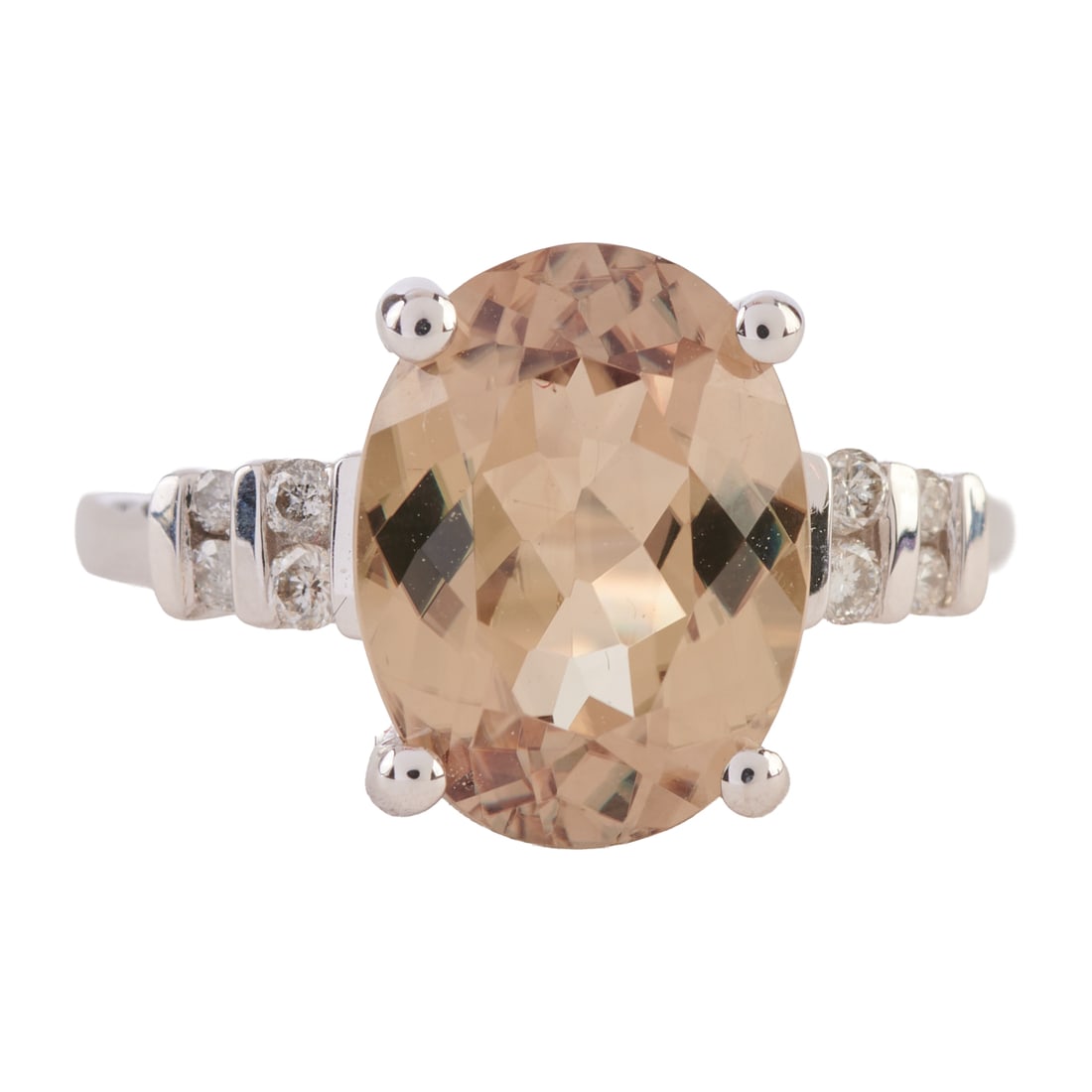 Idocrase, Diamond, 14k White Gold Ring. Featuring one oval-cut idocrase weighing approximately 4.30: Idocrase, Diamond, 14k White Gold Ring. Featuring one oval-cut idocrase weighing approximately 4.30 cts., accented by eight full-cut diamonds weighing a total of approximately 0.15 cttw., set in a 14k