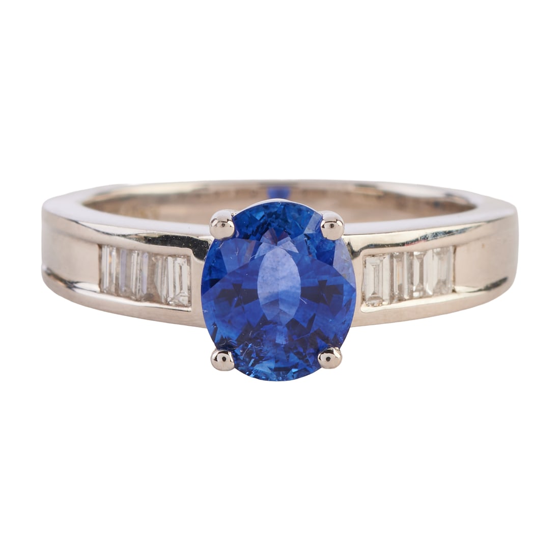 Rhapsody Sapphire, Diamond, Platinum Ring. Featuring one oval-cut sapphire weighing approximately: Rhapsody Sapphire, Diamond, Platinum Ring. Featuring one oval-cut sapphire weighing approximately 1.50 ct., accented by eight baguette-cut diamonds weighing a total of approximately 0.20 cttw., set in