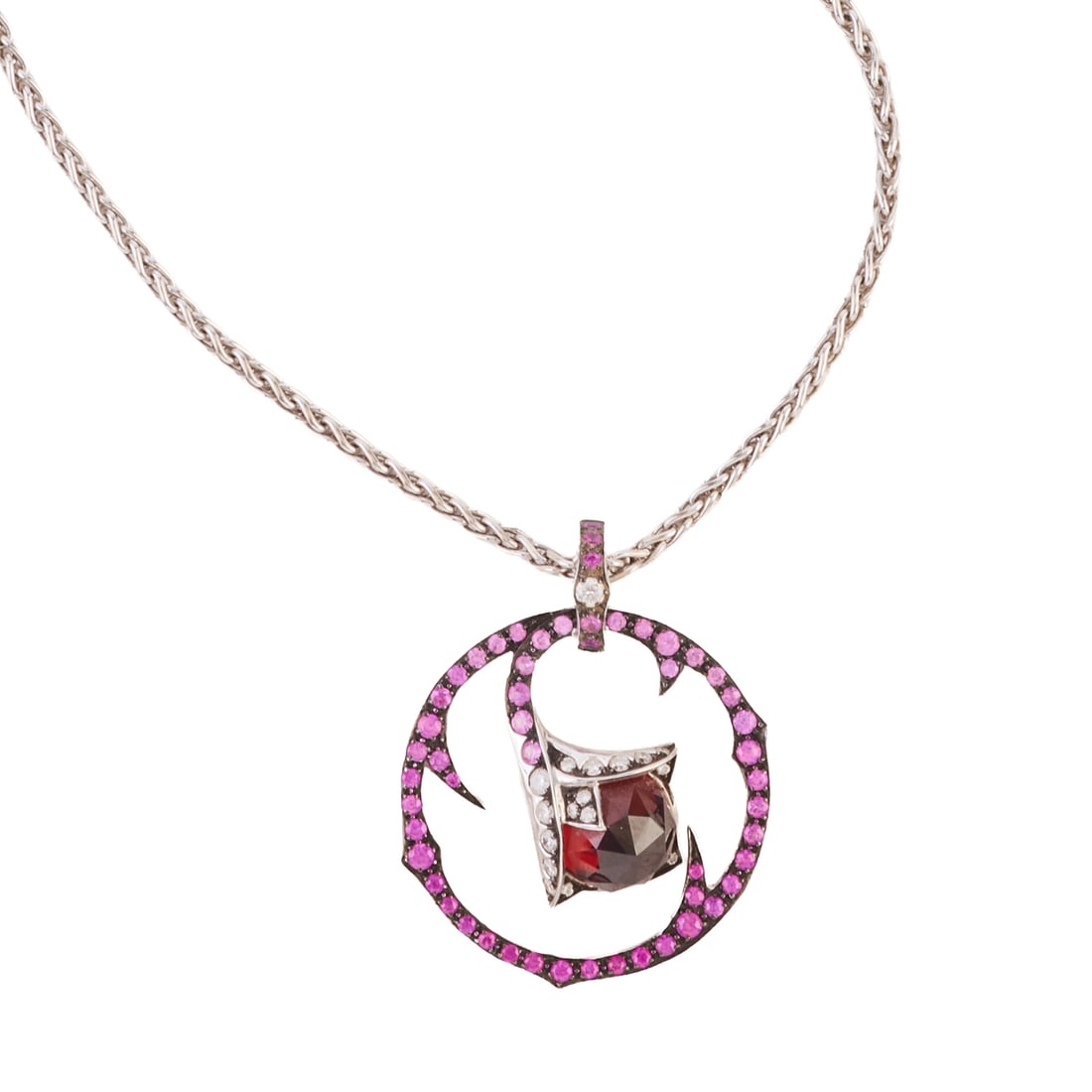 Stephen Webster "Wild Rose" Garnet, Pink Sapphire, Diamond, 18k White Gold Necklace. Designed as a: Stephen Webster "Wild Rose" Garnet, Pink Sapphire, Diamond, 18k White Gold Necklace. Designed as a rose bud in a circle of thorns, the bud comprised of a faceted garnet, accented by round-cut pinks sa