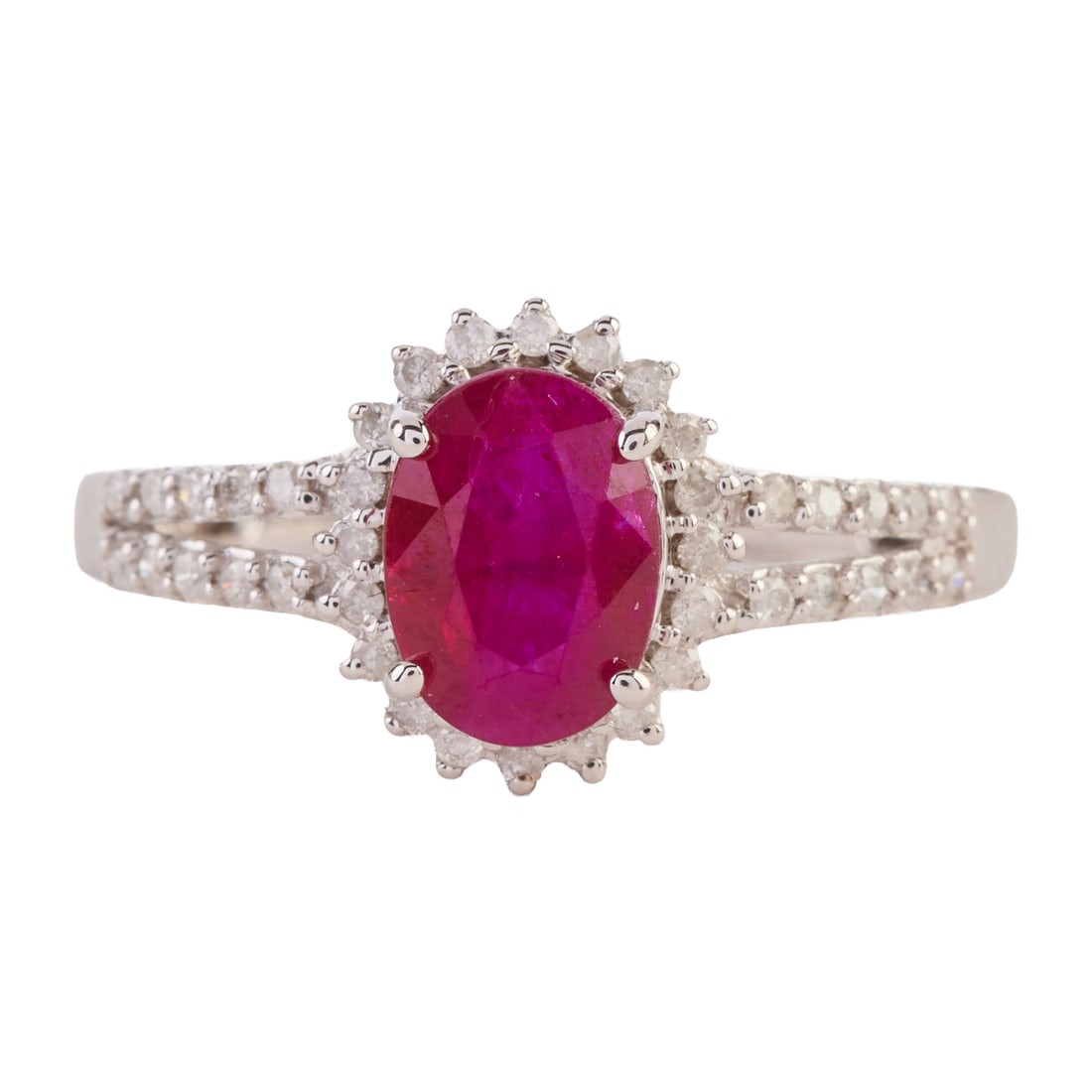 Ruby, Diamond, 14k White Gold Ring. Featuring one oval-cut ruby weighing approximately 1.50 ct.,: Ruby, Diamond, 14k White Gold Ring. Featuring one oval-cut ruby weighing approximately 1.50 ct., accented by forty full-cut diamonds weighing a total of approximately 0.20 cttw., set in a 14k white go