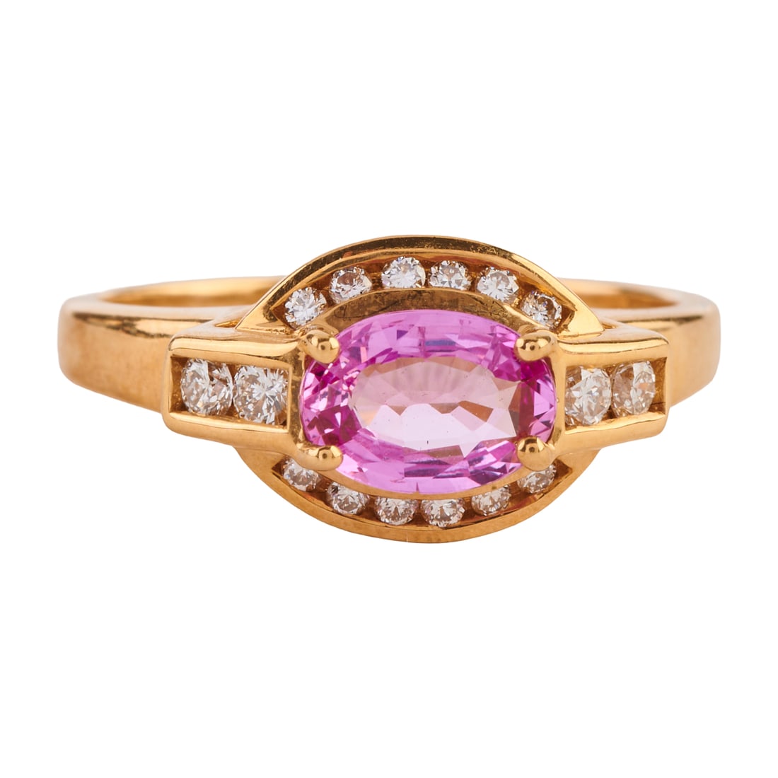 Pink Sapphire, Diamond, 18k Yellow Gold Ring. Featuring one oval-cut pink sapphire weighing: Pink Sapphire, Diamond, 18k Yellow Gold Ring. Featuring one oval-cut pink sapphire weighing approximately 0.75 ct., accented by twenty-six full-cut diamonds weighing a total of approximately 0.25 cttw