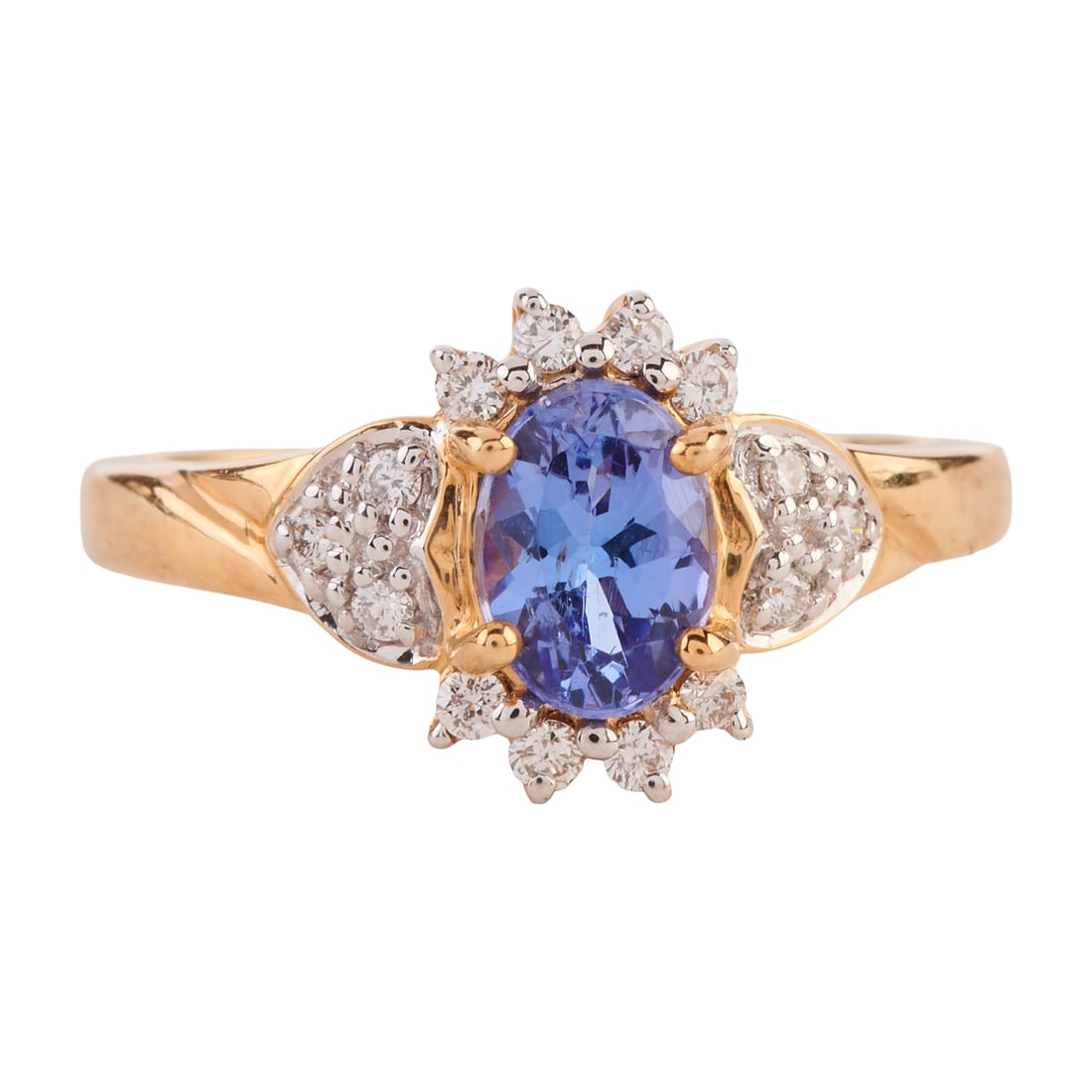 Tanzanite, Diamond, 14k Yellow Gold Ring. Featuring one oval-cut tanzanite weighing approximately: Tanzanite, Diamond, 14k Yellow Gold Ring. Featuring one oval-cut tanzanite weighing approximately 0.70 ct., accented by fourteen full-cut diamonds weighing a total of approximately 0.07 cttw., set in 