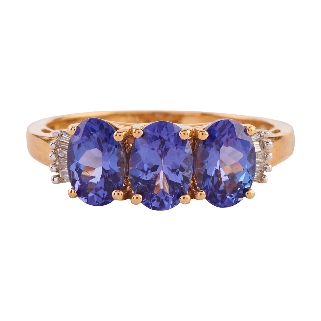 Iliana Tanzanite, Diamond, 18k Yellow Gold Ring. Featuring three oval-cut tanzanites weighing a: Iliana Tanzanite, Diamond, 18k Yellow Gold Ring. Featuring three oval-cut tanzanites weighing a total of approximately 1.75 cttw., accented by ten tapered baguette-cut diamonds, set in an 18k yellow g
