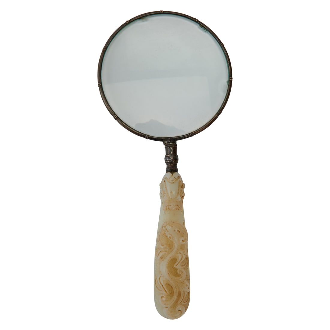 A Chinese Carved White Jade Belt Hook Mounted as a Magnifying GlassA Chinese carved white jade belt: A Chinese Carved White Jade Belt Hook Mounted as a Magnifying GlassA Chinese carved white jade belt hook, later mounted as the handle of a magnifying glass. The jade is finely carved in relief and ope