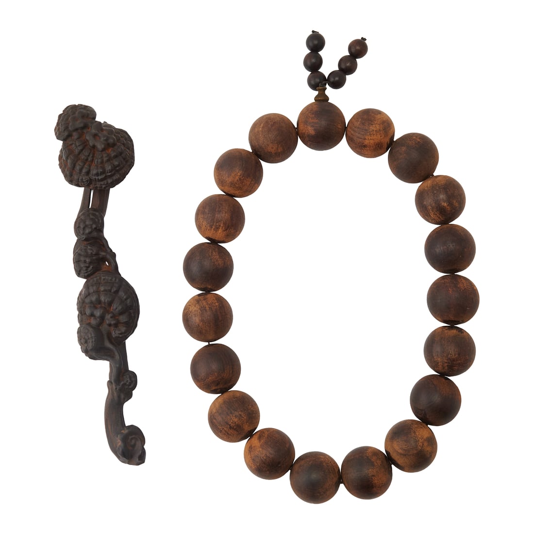 A Large Wood Prayer Bead Bracelet and Carved Ruyi ScepterA large strand of oversized wooden prayer: A Large Wood Prayer Bead Bracelet and Carved Ruyi ScepterA large strand of oversized wooden prayer beads, each bead of spherical form with a naturally figured grain and warm brown patina, accompanied 