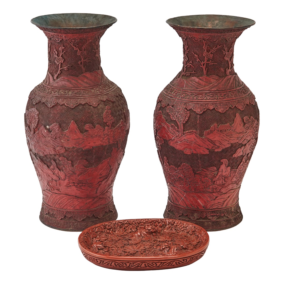 A GROUP OF THREE CHINESE CINNABAR LACQUER WARESThis group comprises a pair of monumental carved (1 of 4)