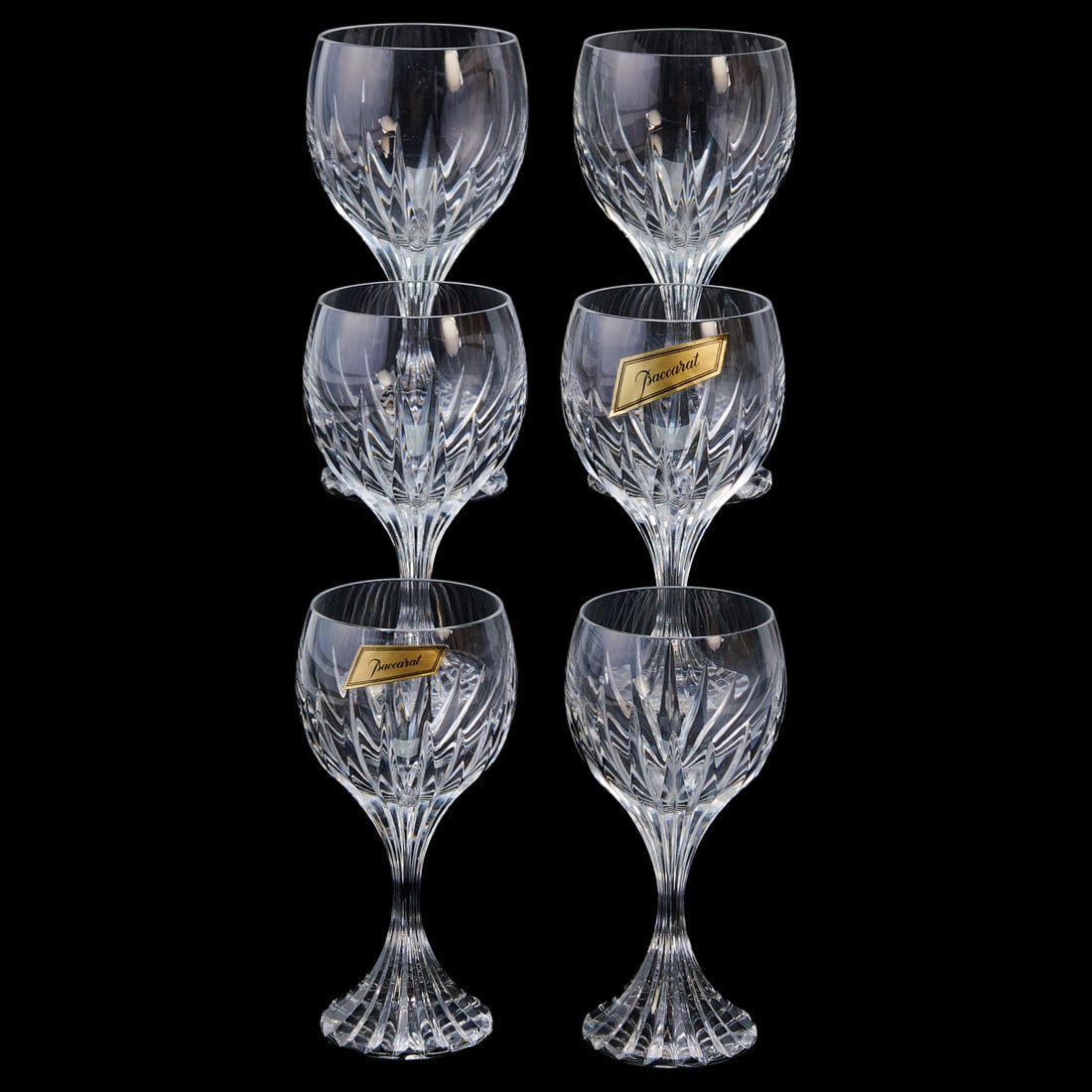 Baccarat Crystal Massena Stemware: Baccarat Crystal Massena Stemware. Comprising nine water goblets, 12 white wine glasses, and 12 red wine glasses in a flared facet cut design. Each base underside with engraved Baccarat and pictorial 