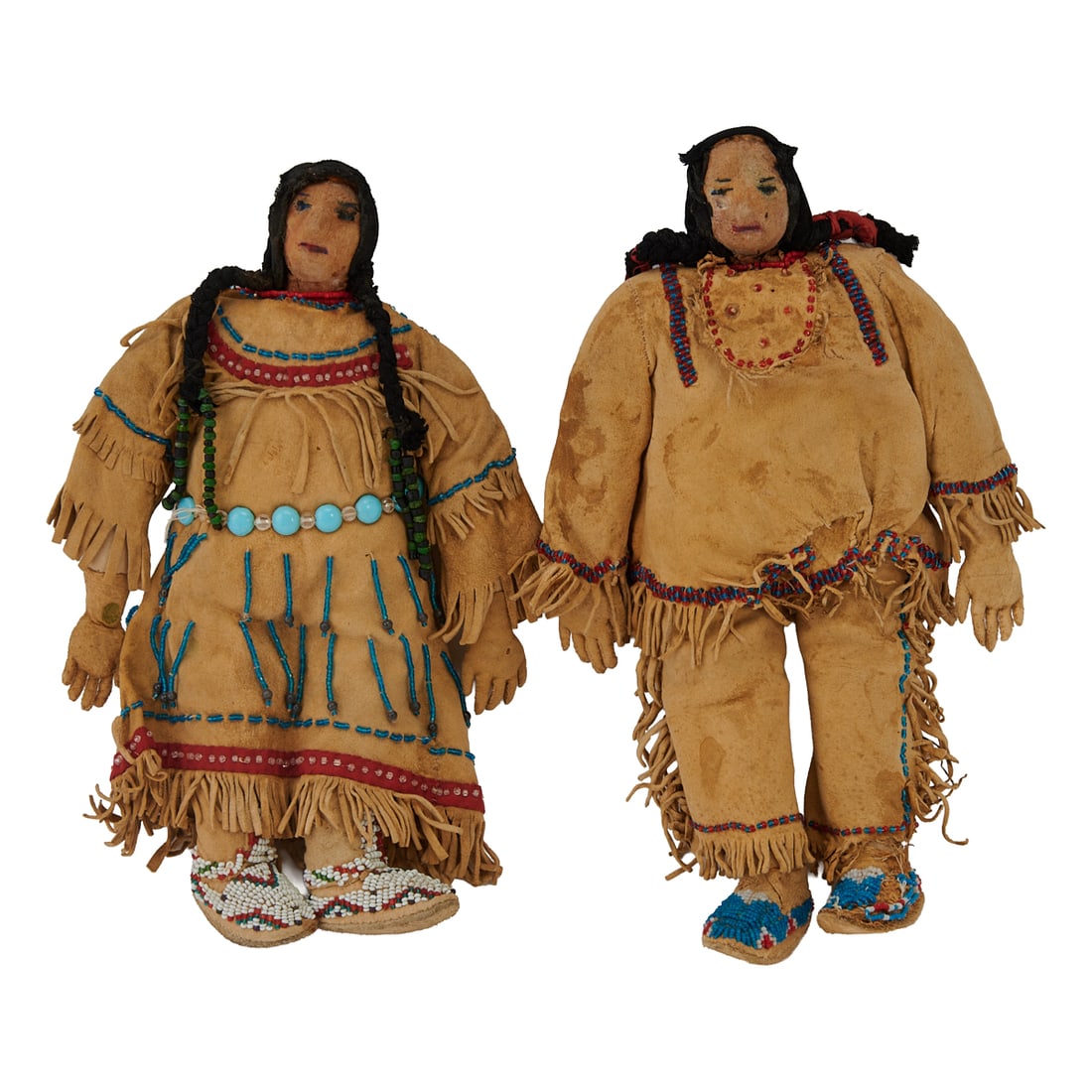 Native American Male and Female Beaded Hide Dolls: Native American Male and Female Beaded Hide Dolls, probably Sioux, each worked with beads in red, clear, turquoise and white, the black plaits made with fabric.{Approximate dimensions: 10 1/2" long x 