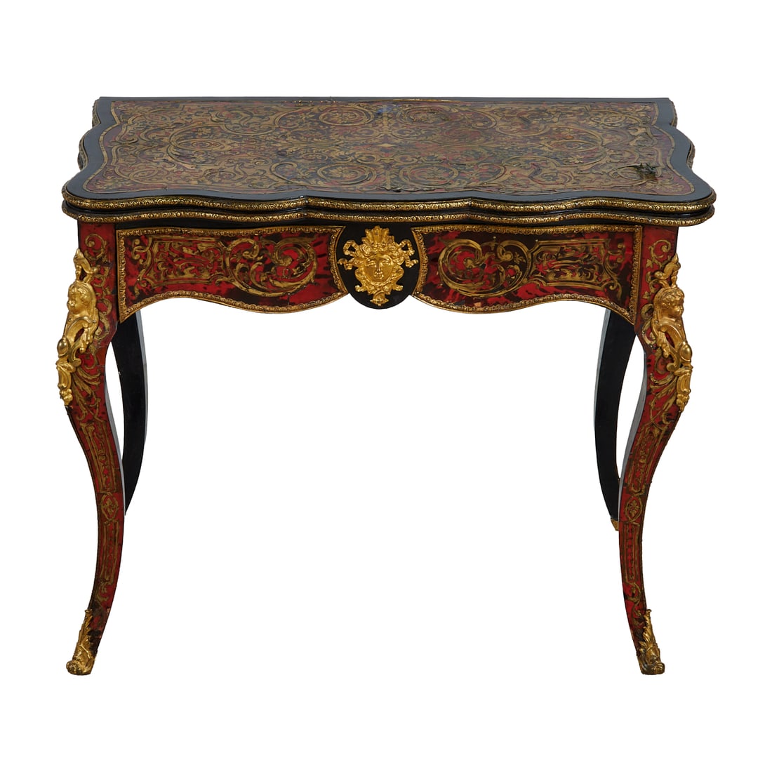 Napoleon III Boulle Games Table: Napoleon III Boulle Games Table, the scalloped rectangular top over the skirt, and with cabriole legs, all with extensive brass decoration of scrolls and flowers and geometric forms, with gilt metal f