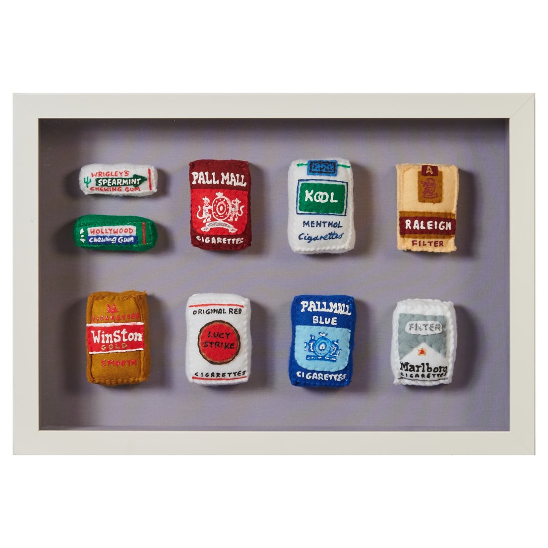 Lucy Sparrow, Cigarettes and Chewing Gum, Hand-Stitched Felt: Lucy Sparrow (English, born 1986), Cigarettes and Chewing Gum, framed hand-stitched stuffed felt and paint pen. Cigarettes and Chewing Gum includes Wrigley's Spearmint Chewing Gum, Hollywood Chewing